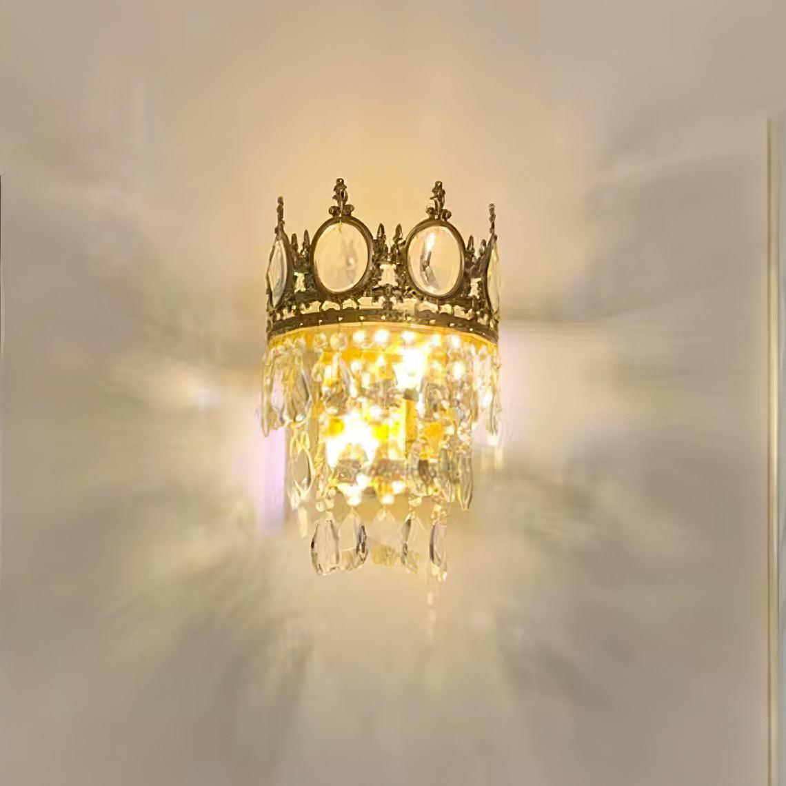 Crystal drops casting light patterns on a pale wall