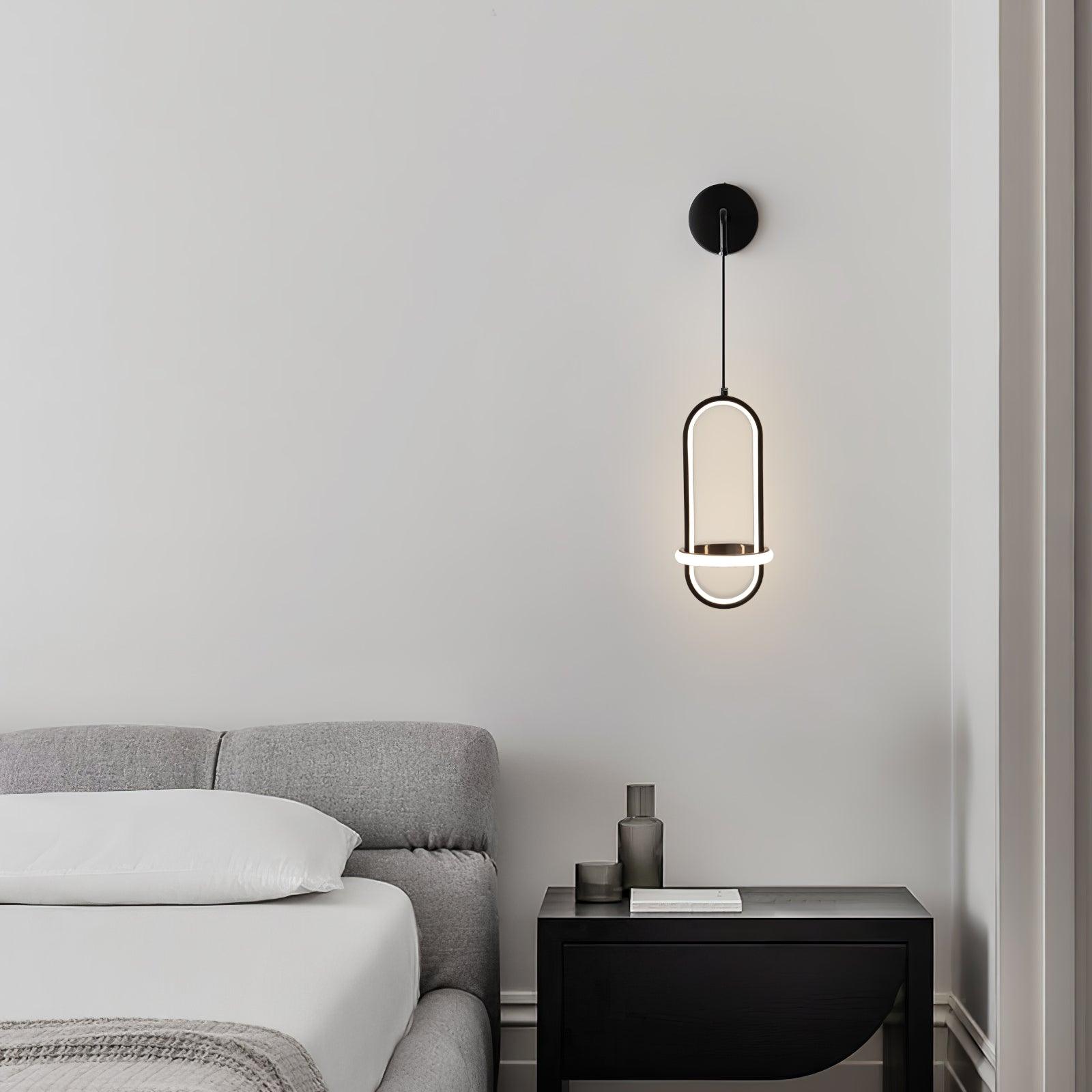 Oval Brass suspended ring LED wall light