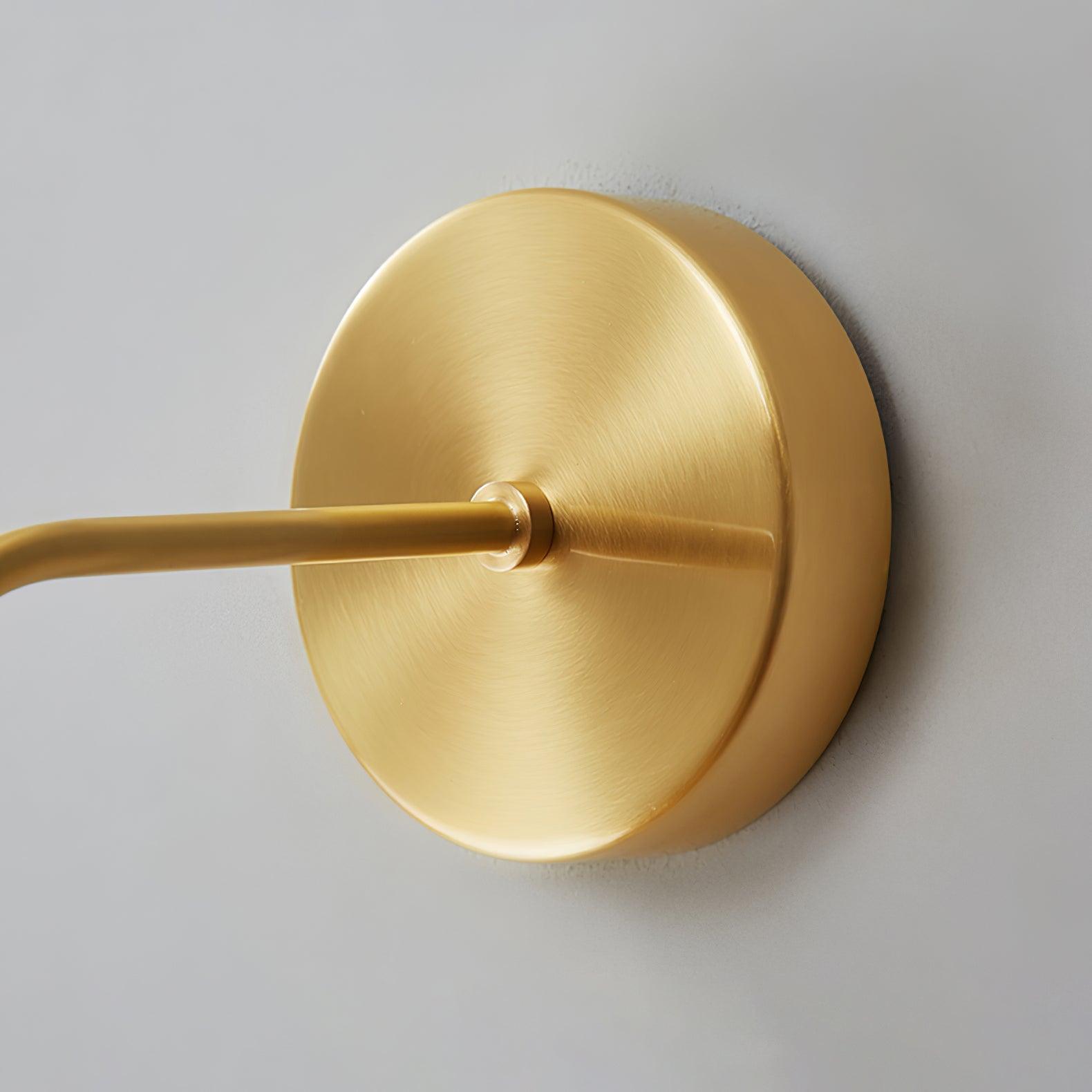 Close view of Brass round wall plate and short arm