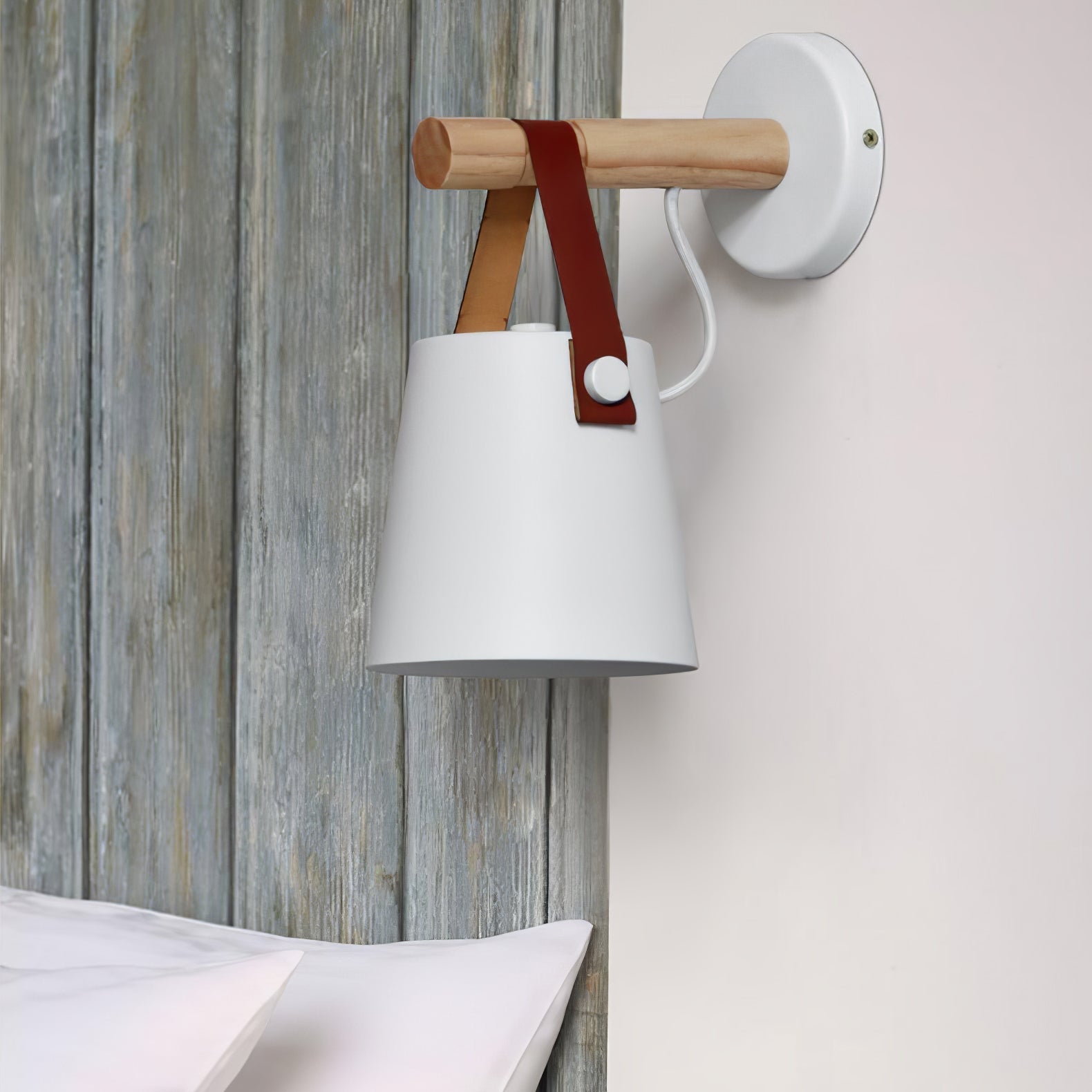 White shade on a wood bar beside a bed