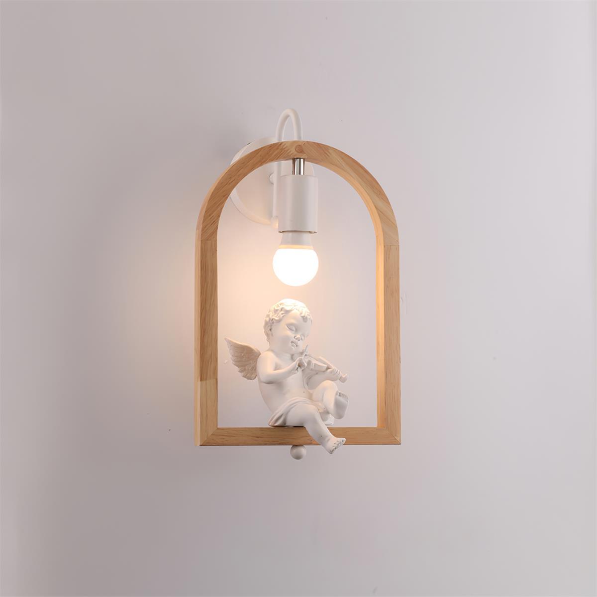 Model B wall light with a seated winged cherub playing violin inside a wooden arch below a lit bulb