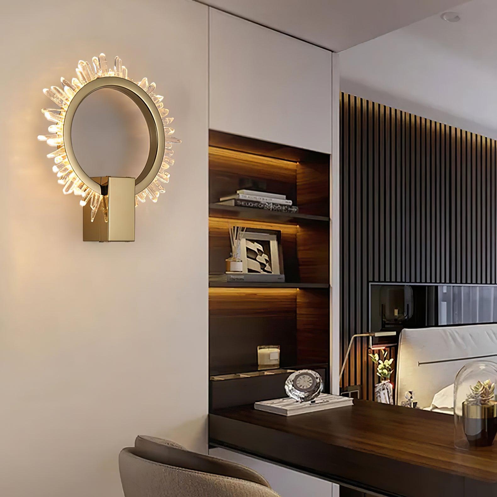 Wider dressing-area view of a crystal ring wall light beside a mirror and wooden desk