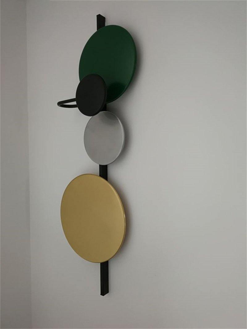 Green disc fixture viewed at an angle