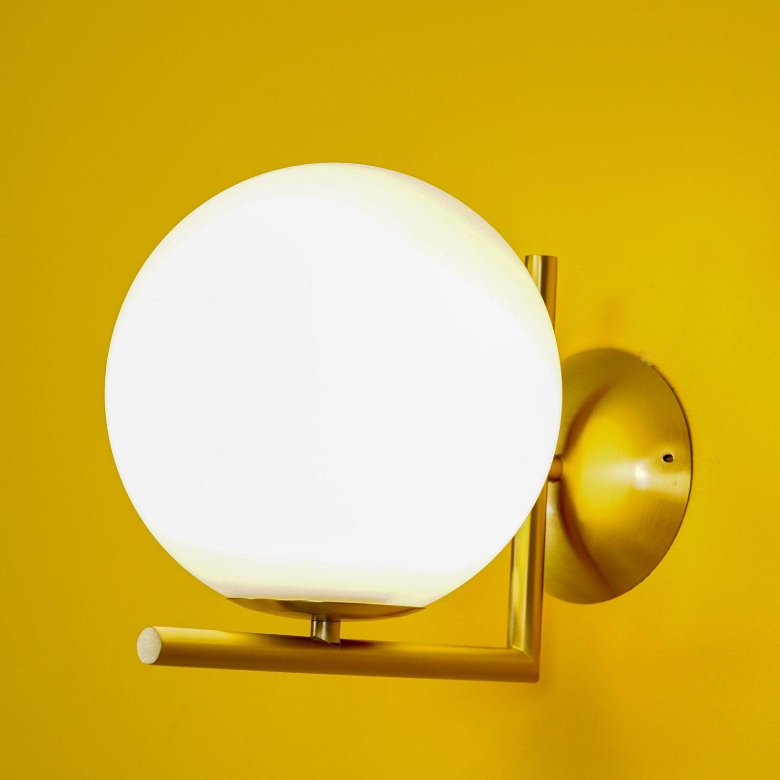 Opal glass globe wall light