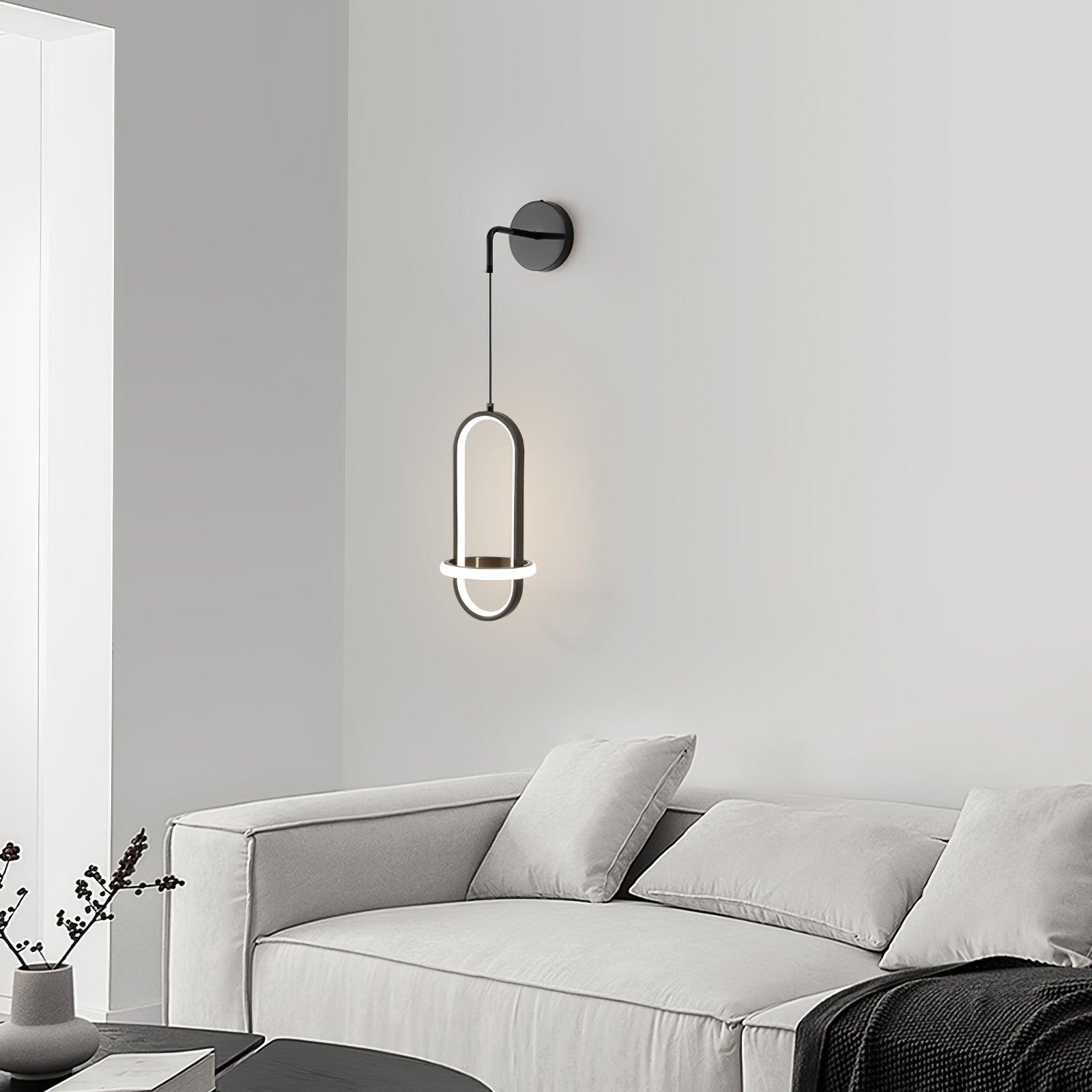 Oval Brass suspended ring LED wall light