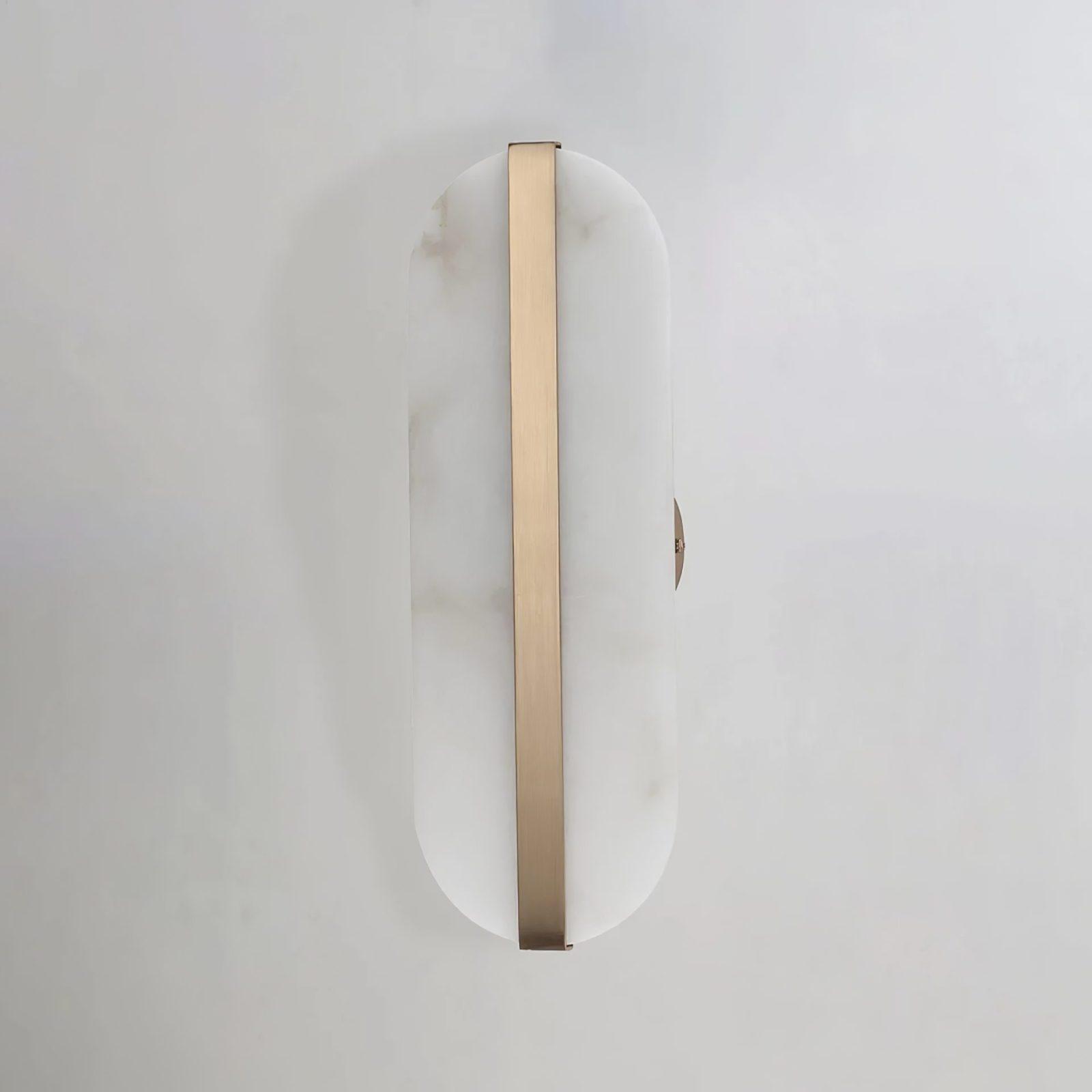 Vertical White capsule sconce on a pale wall