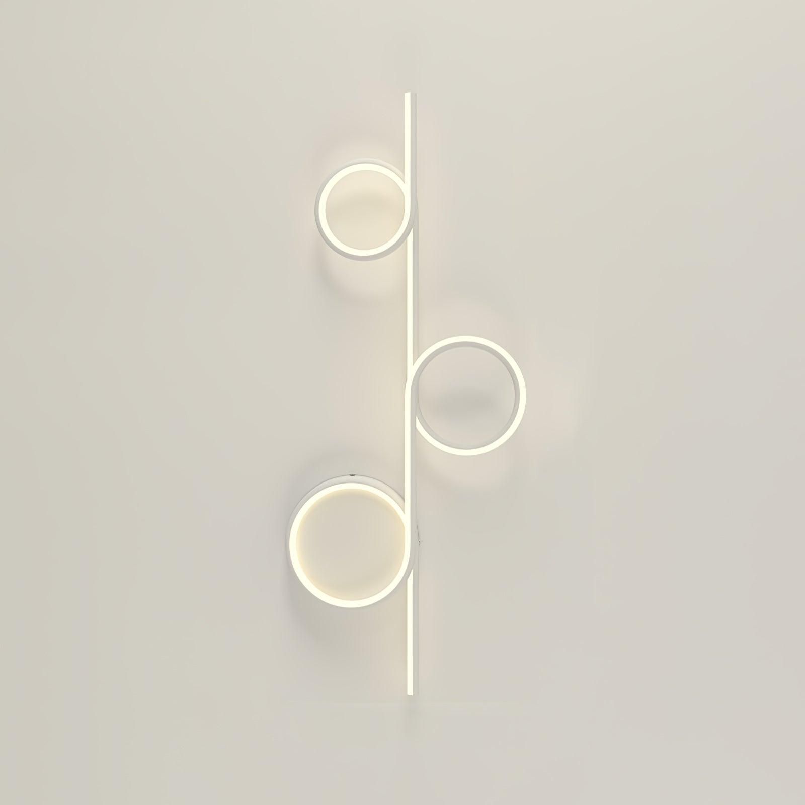 White Rhythmic Line LED light with three circular elements along the bar