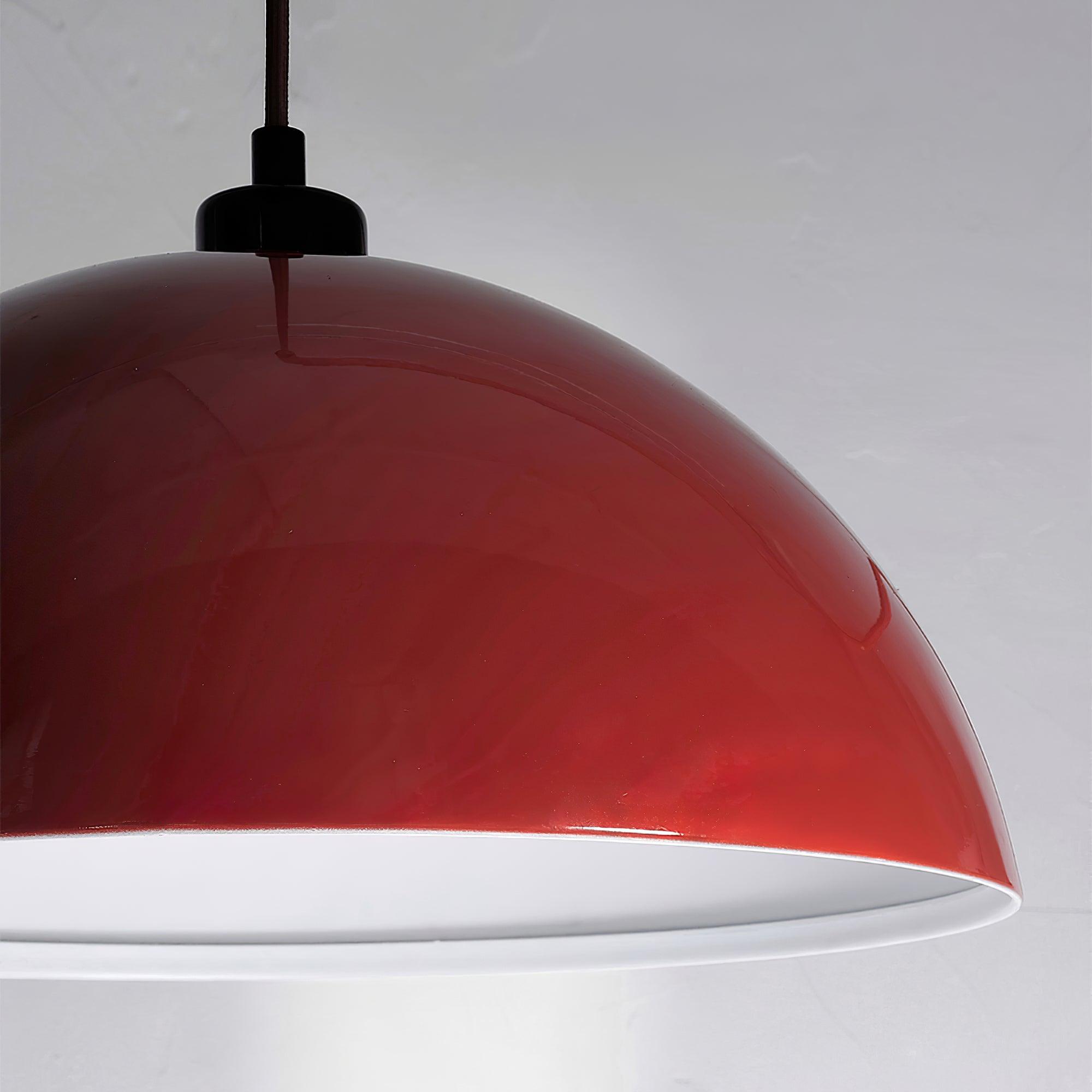 Red hemispherical shade and white underside close view