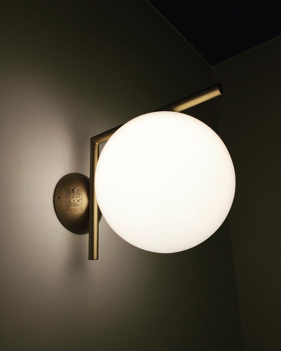 Opal glass globe wall light