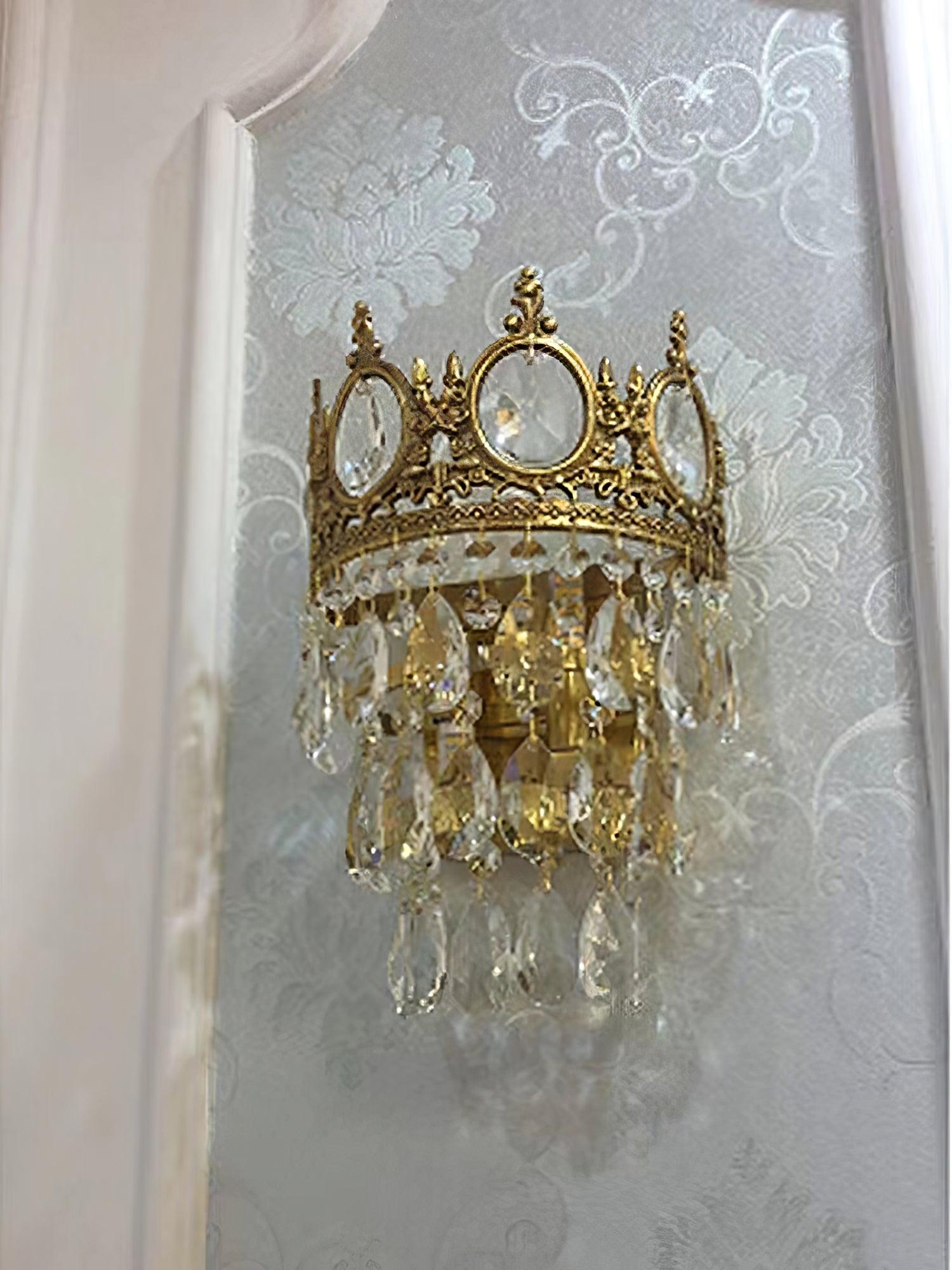Unlit crystal sconce on patterned wall panelling