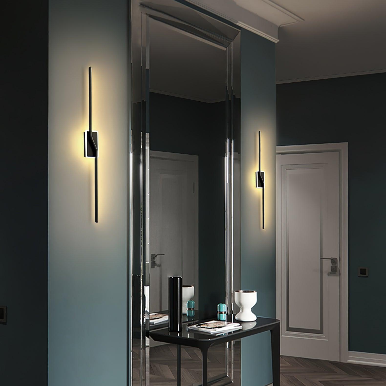 Black strip lights beside an interior mirror
