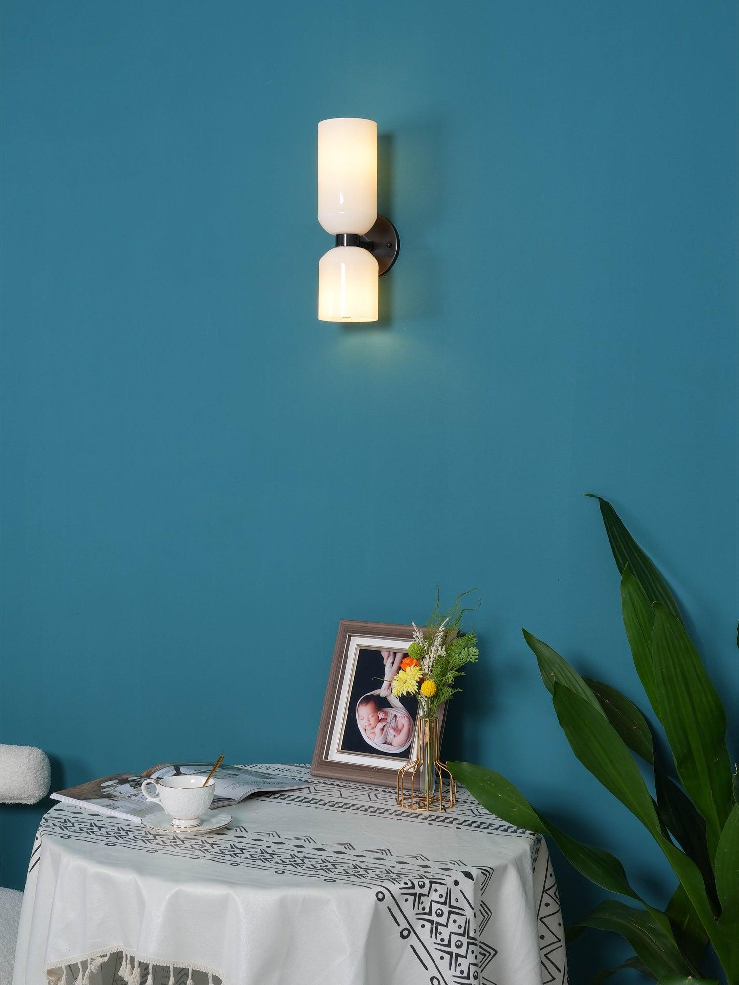Edie glass wall lamp with unequal upper and lower cylinders