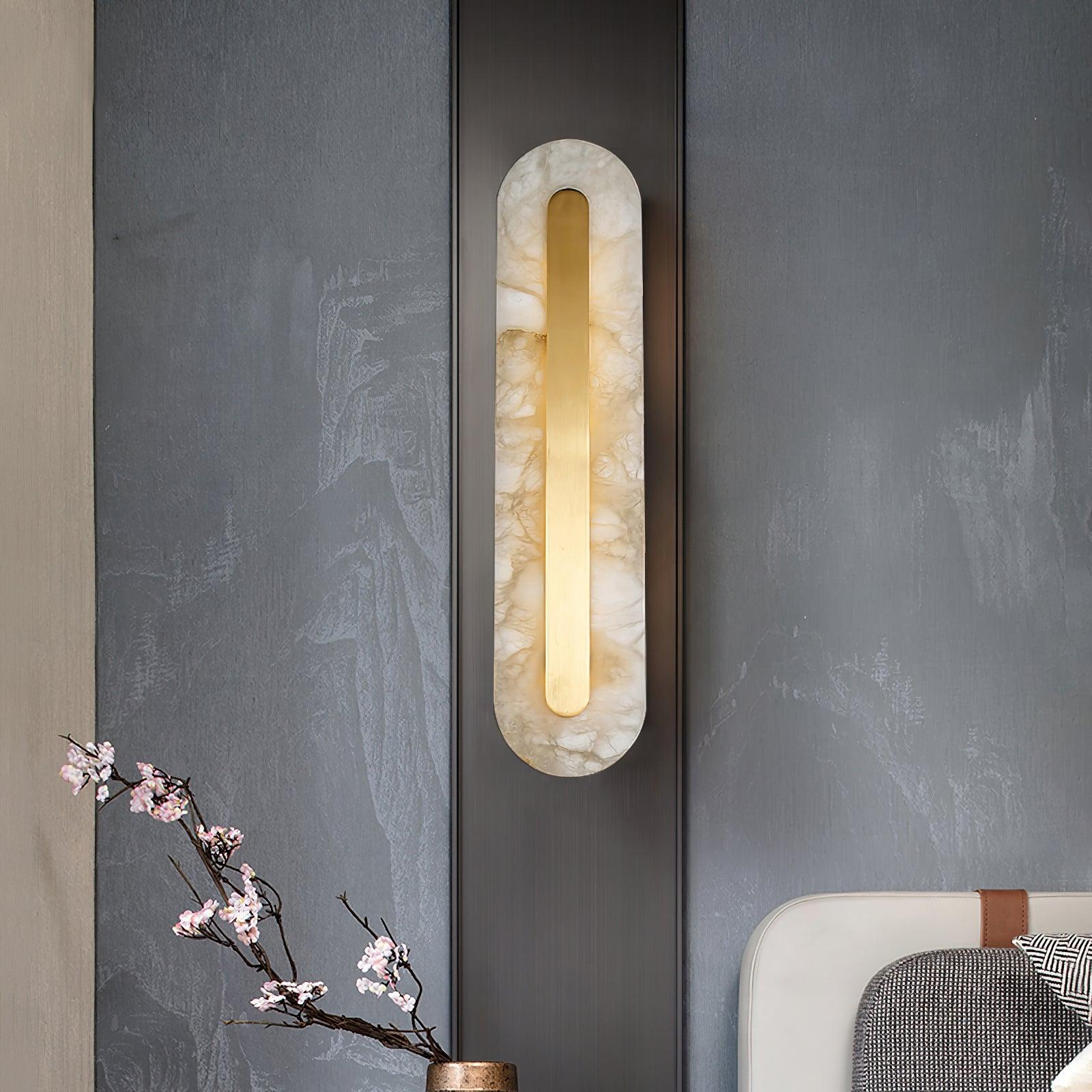 Veined stone light beside a light-coloured chair