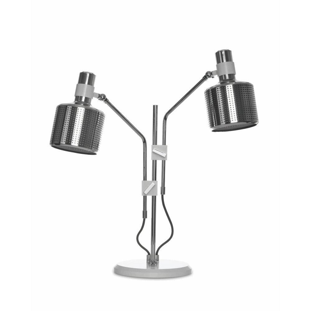 Silver-and-white double-head lamp with two perforated shades, separate arms and white clamps on one round white base