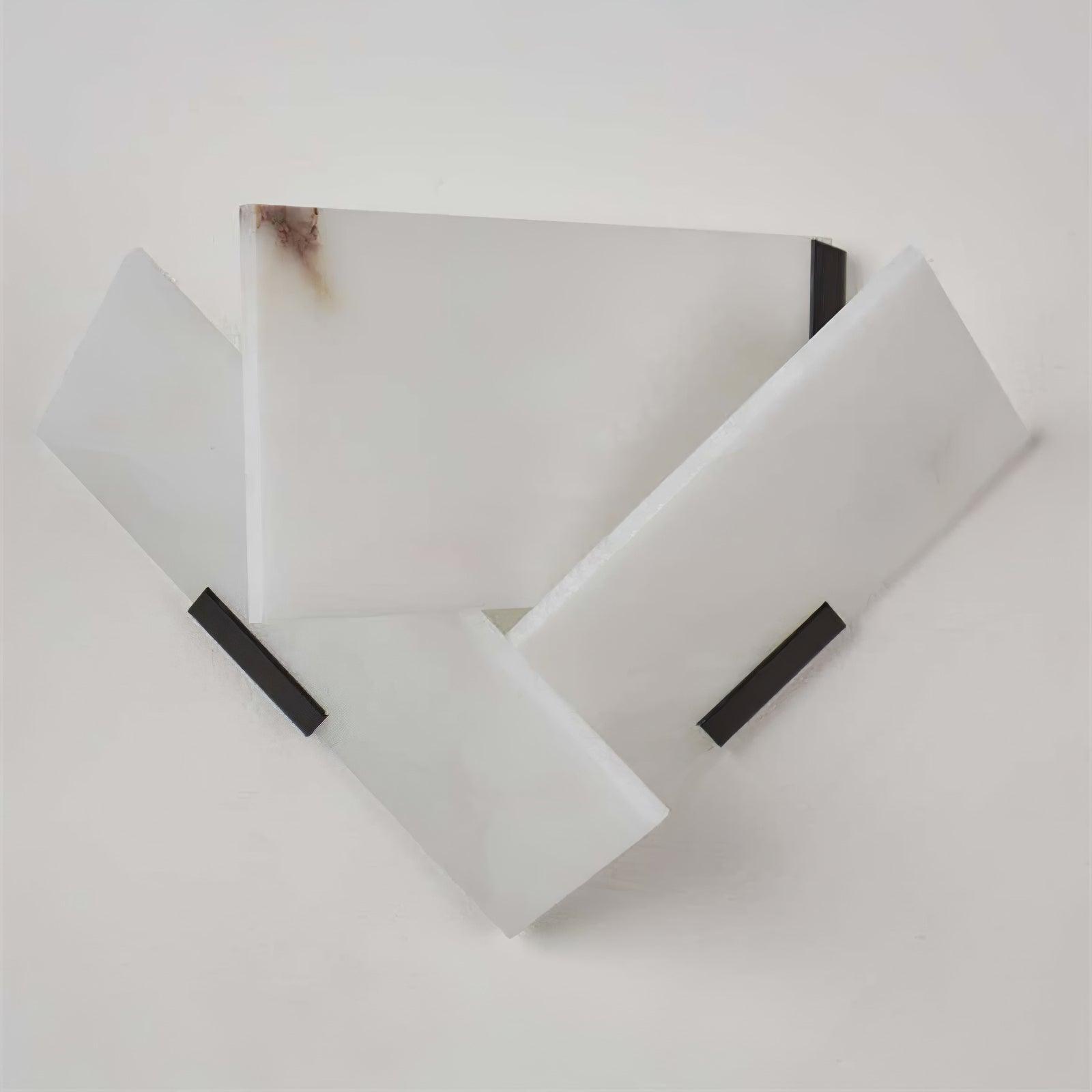 Unlit Right version Fly Alabaster sconce with mirrored white panels and a black rear edge on the right
