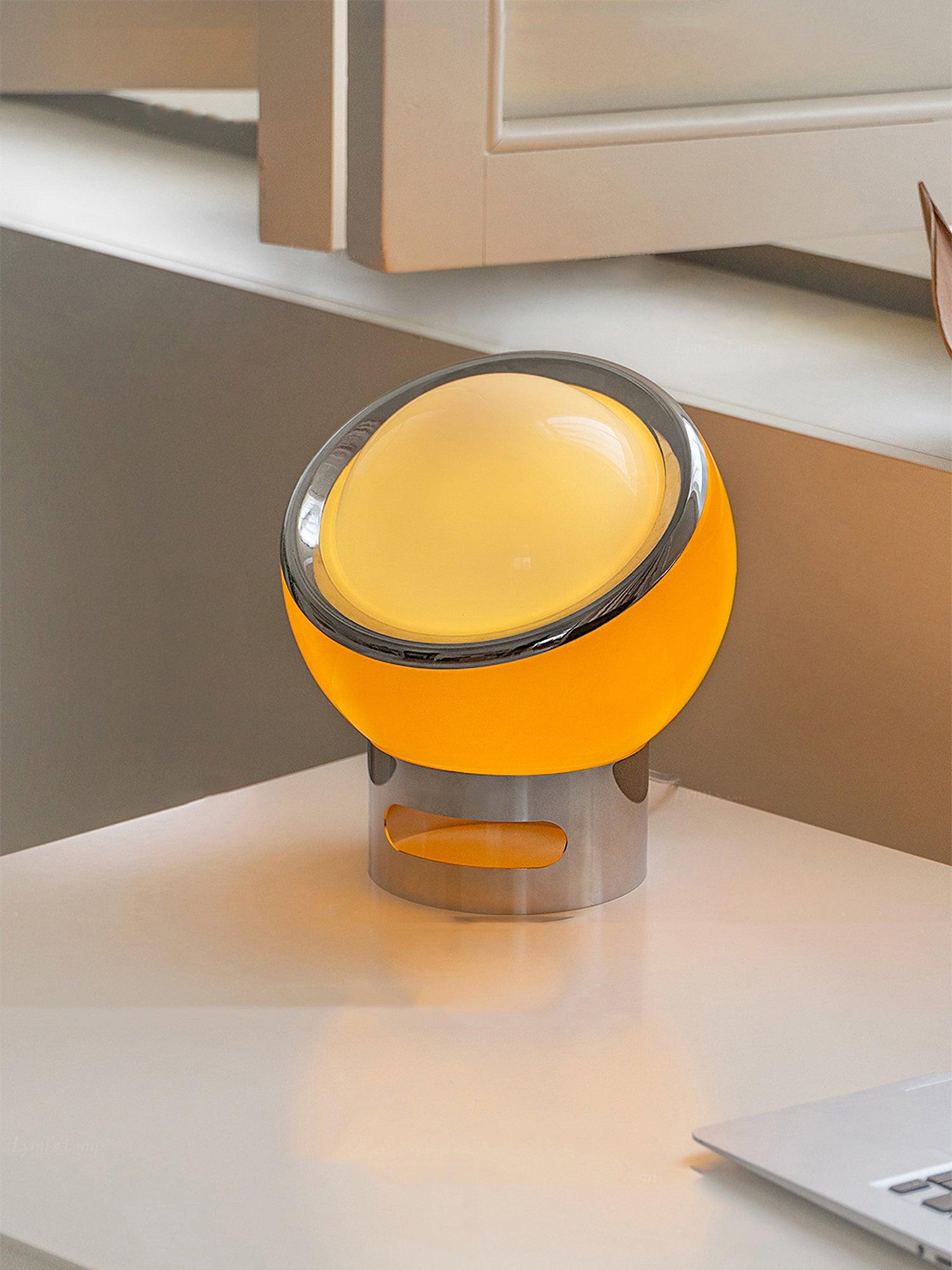 Illuminated Valeria rounded shade on a pale desk