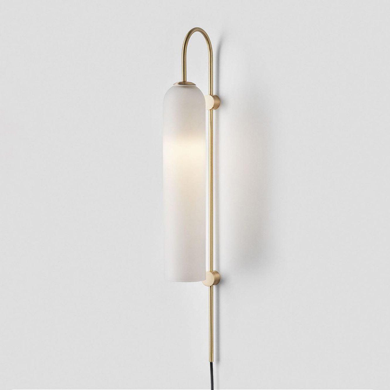 White cylindrical shade and gold-coloured stem