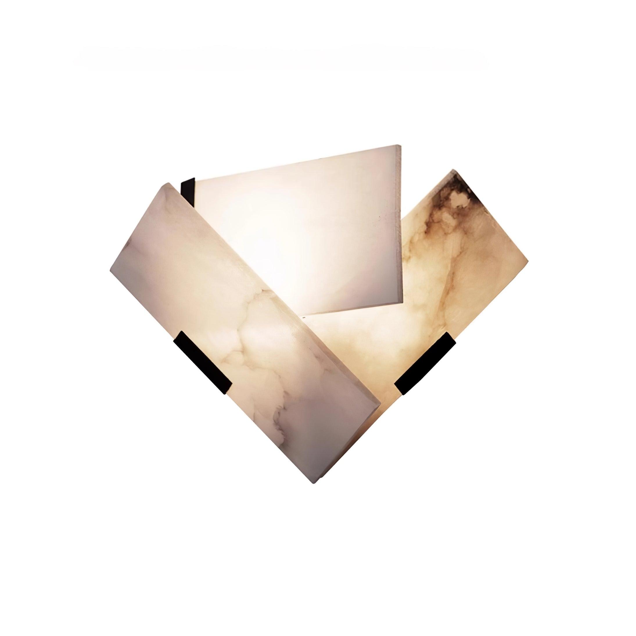 Lit Fly Alabaster sconce on white with an upright panel, overlapping diagonal blades and black clips
