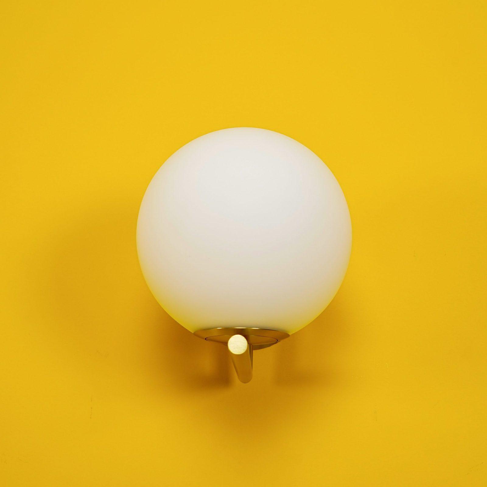 Opal glass globe wall light