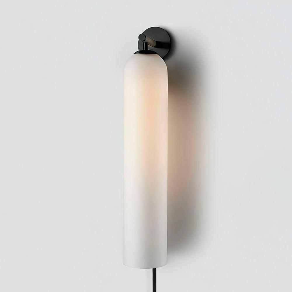 Frosted white cylindrical wall light with black fitting