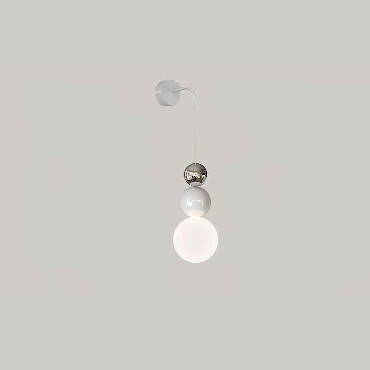 Chrome-and-white Three Ball wall light with a reflective upper sphere and illuminated white lower globe