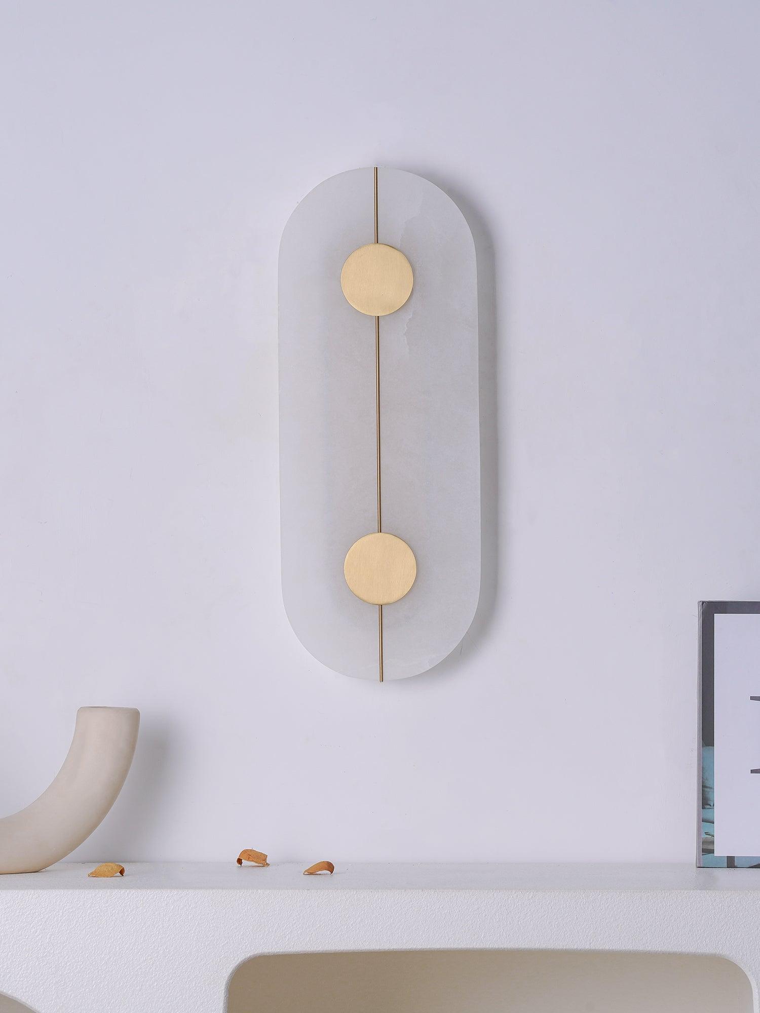 Unlit capsule panel with two circular decorative discs