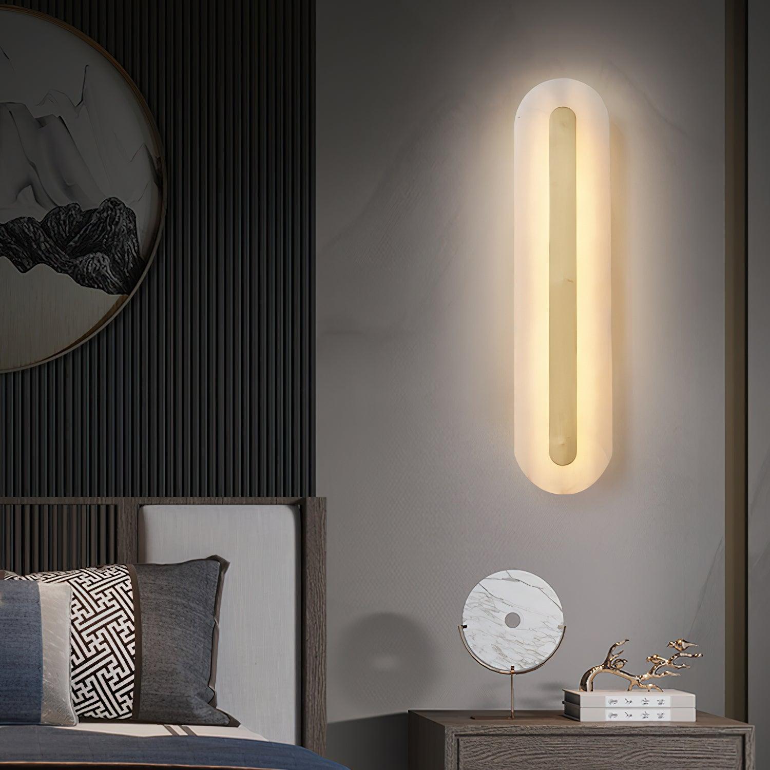 Stone light above a bedside clock