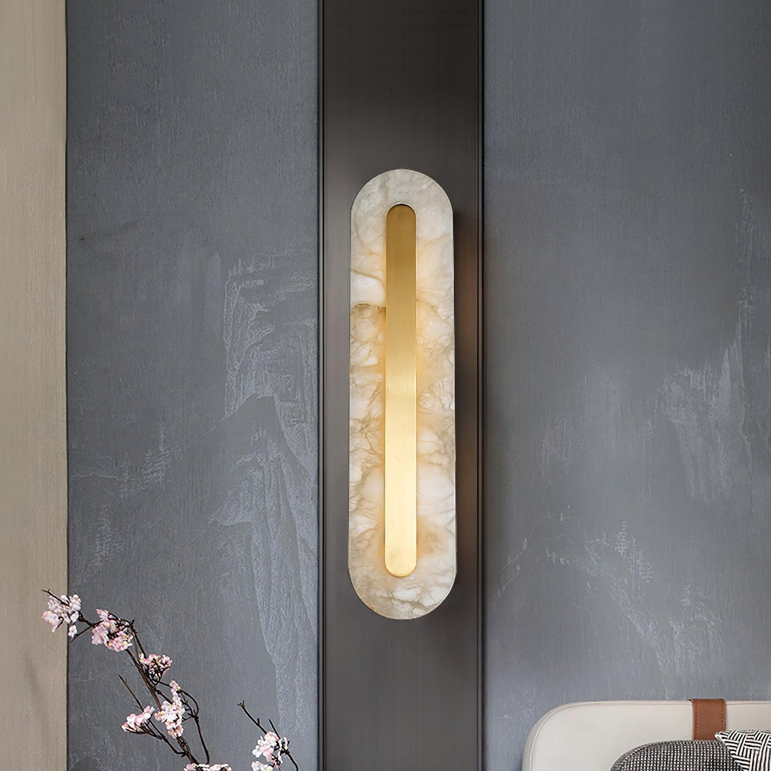 Veined wall light beside an indoor seating area