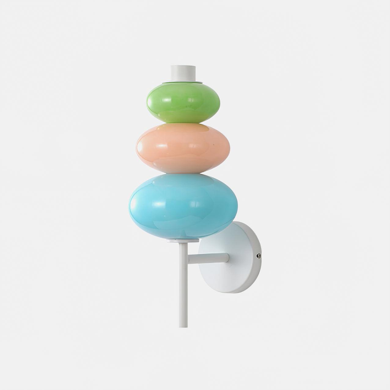 Isolated three-segment glass wall light with a white arm and round plate to the right