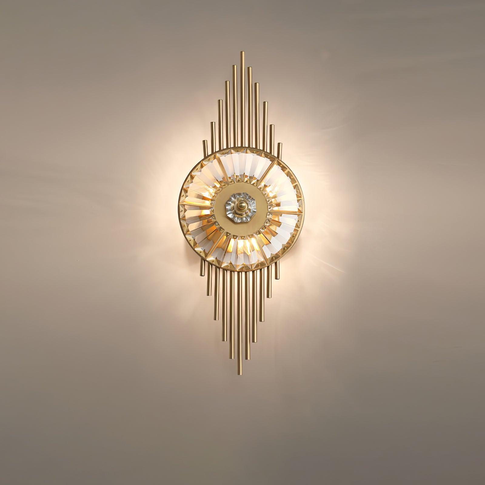 Wider view of the lit circular glass wall lamp with a halo of light on a plain wall
