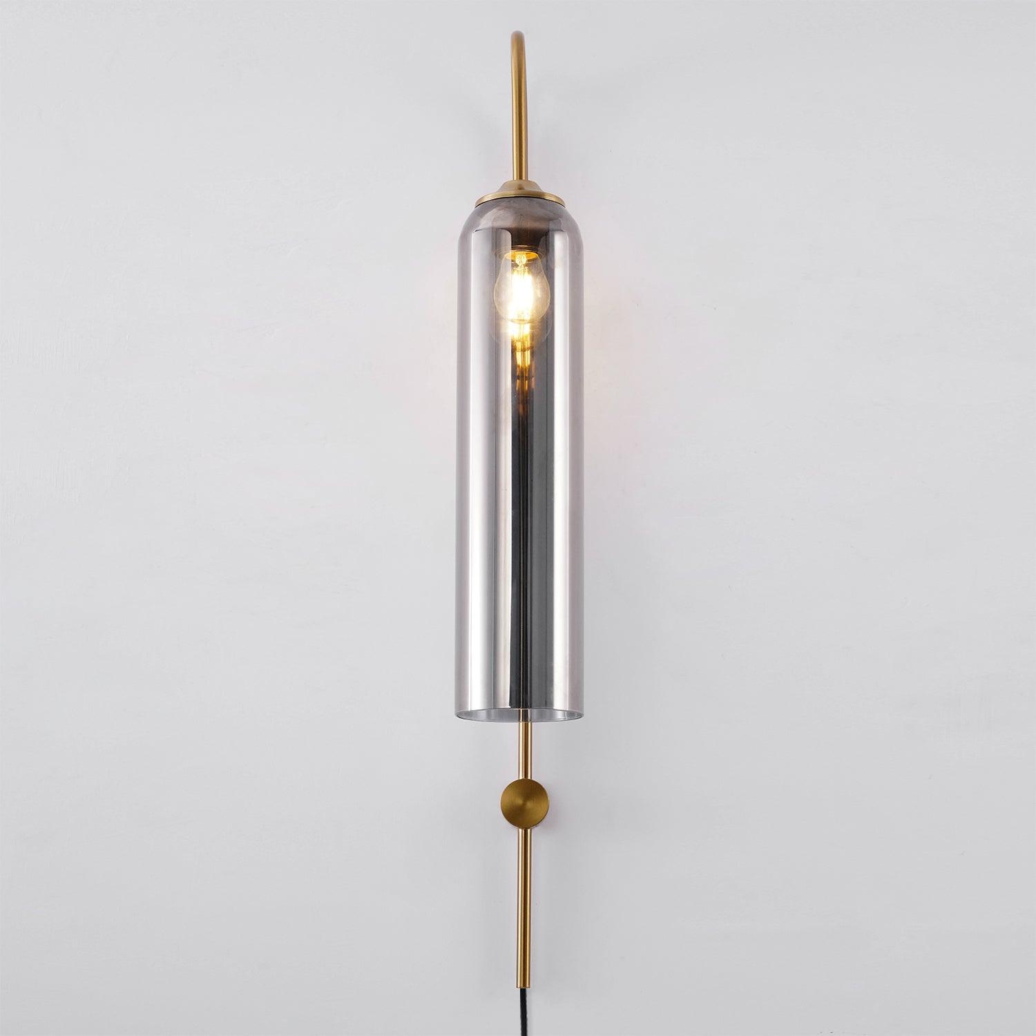 Gold body and reflective shade with a visible bulb
