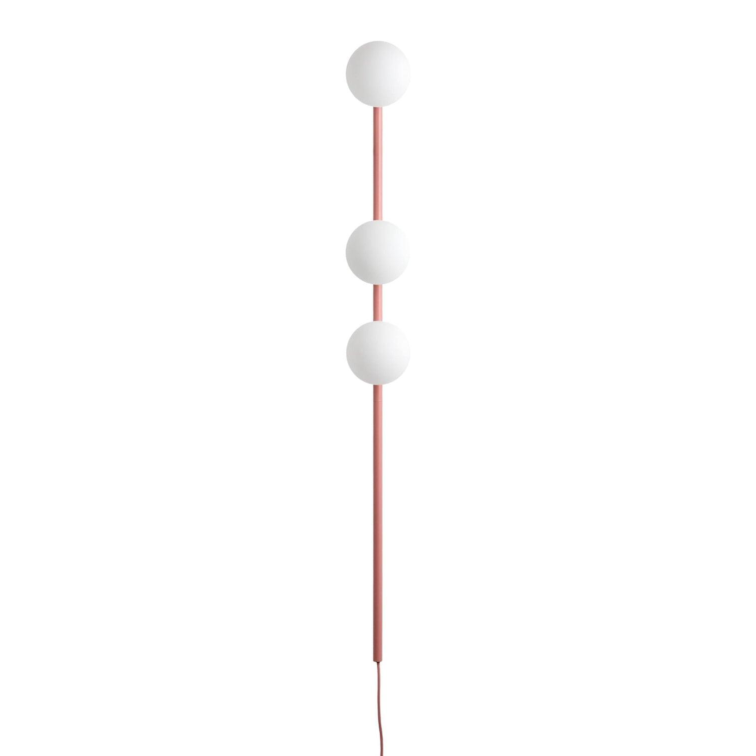 Pink three-globe wall light isolated on white, unlit white spheres, long lower stem and matching cable