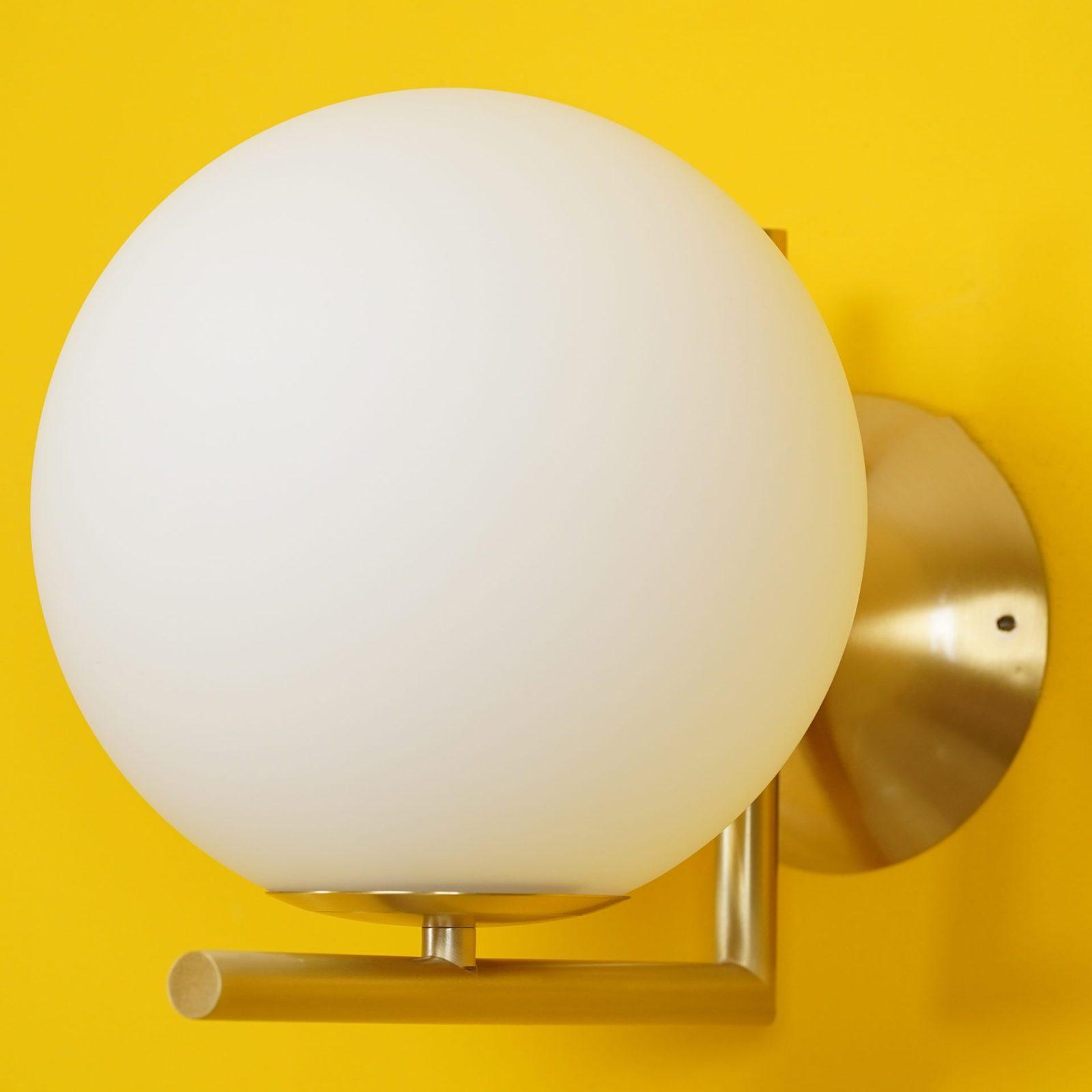 Opal glass globe wall light