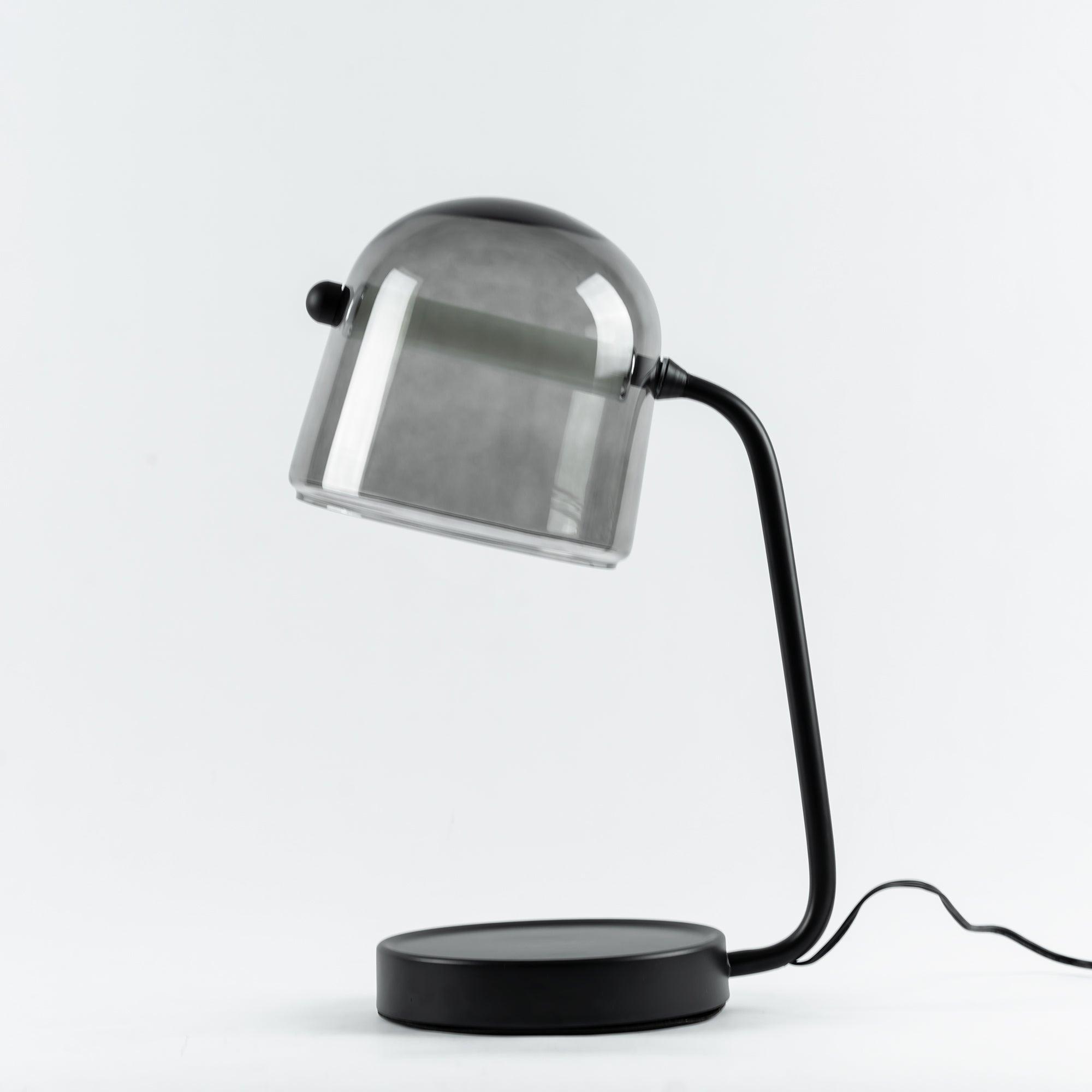 Unlit Mona glass lamp showing the curved dark support
