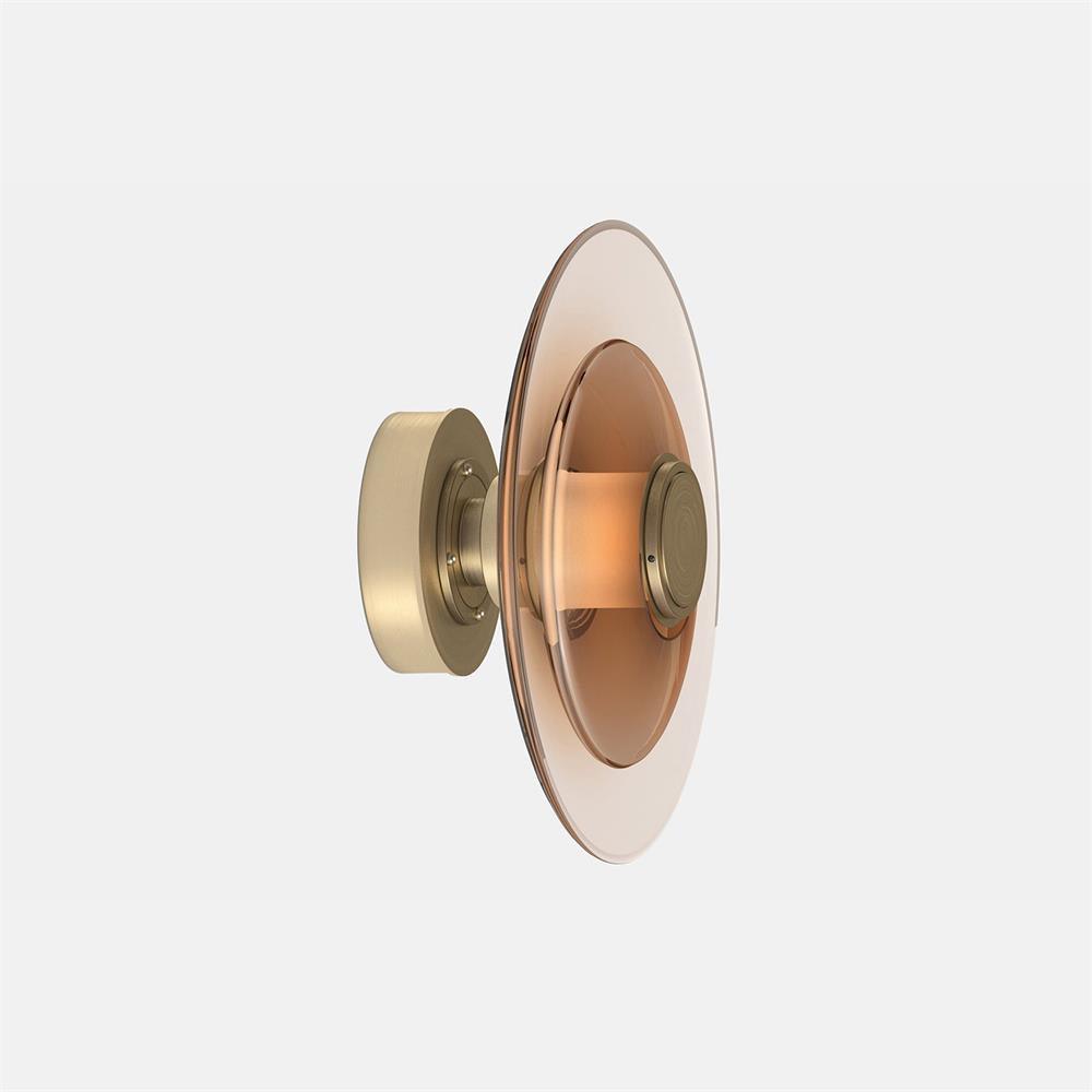 Gold Luna A side view on pale grey, showing round rear wall plate, centre band and amber-toned layered glass discs