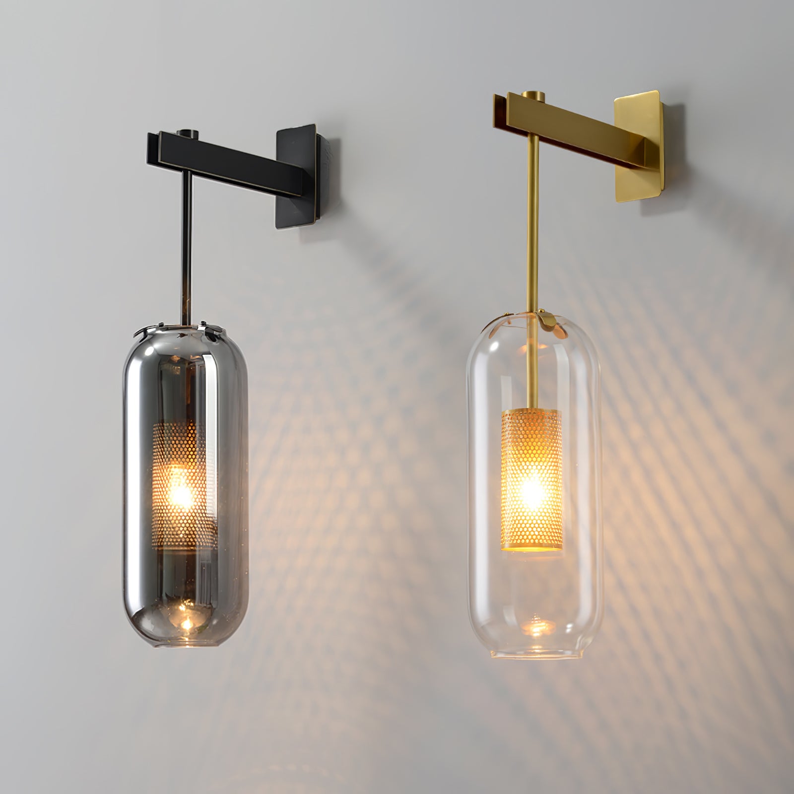 Black and gold-coloured Vadim wall lamps together