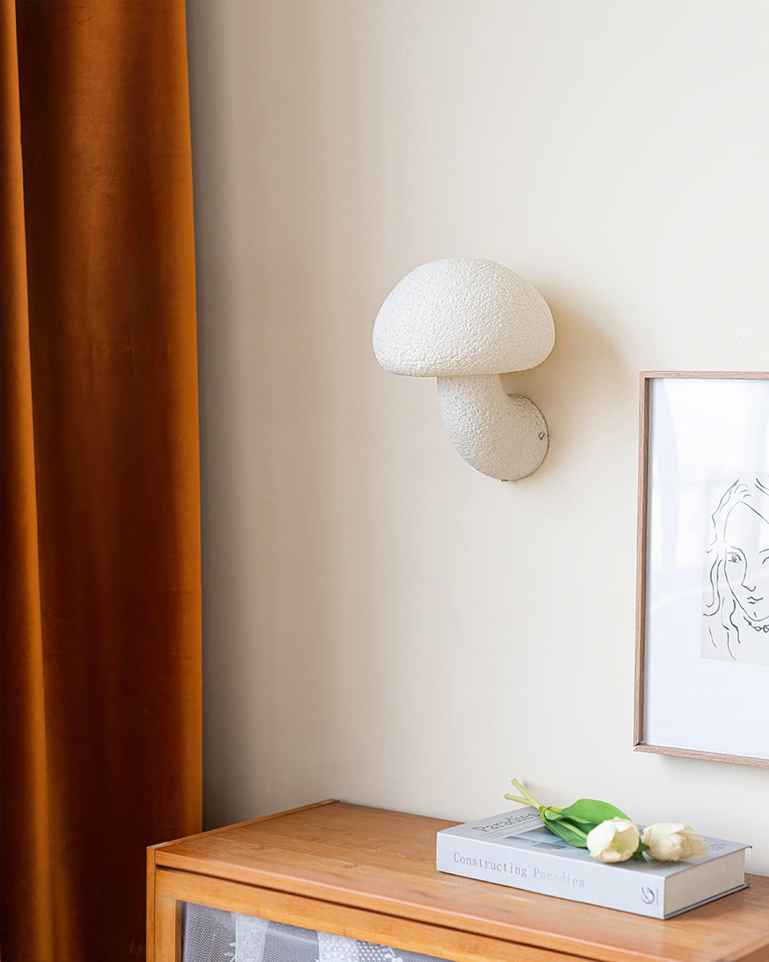 Single White wall lamp above a cabinet