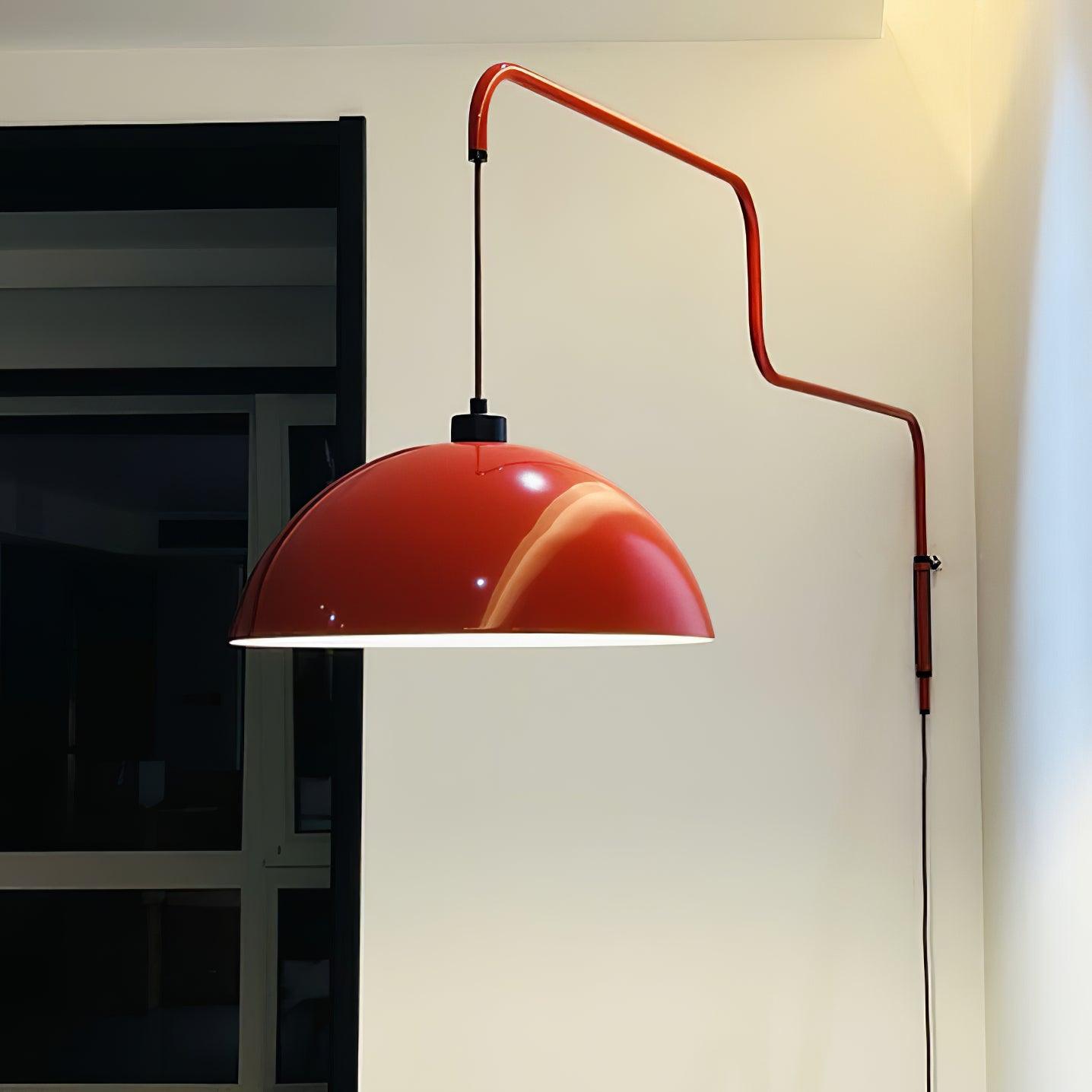 Illuminated red metal dome seen from the side