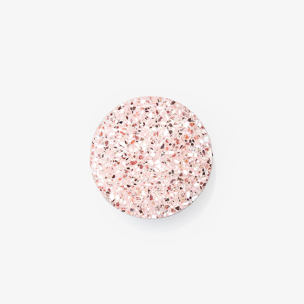 Angled view of pale Pink chip-patterned disc