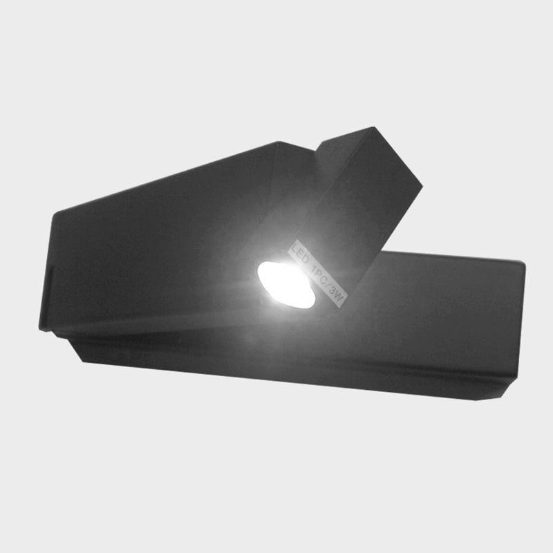 Black folding wall light angled outward with bright circular lens and small LED 1PC/3W label on angular head