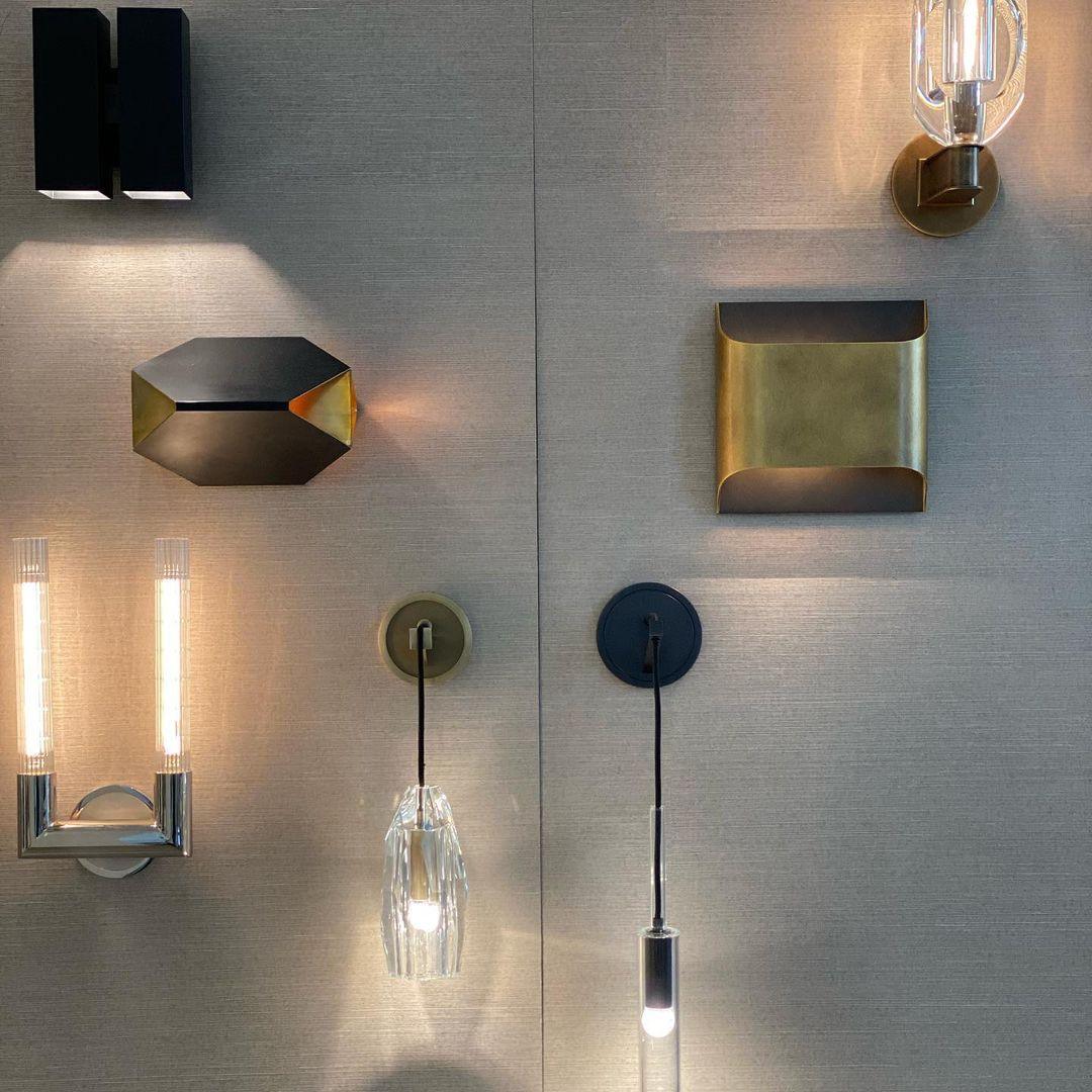 Wall display of several different light fittings