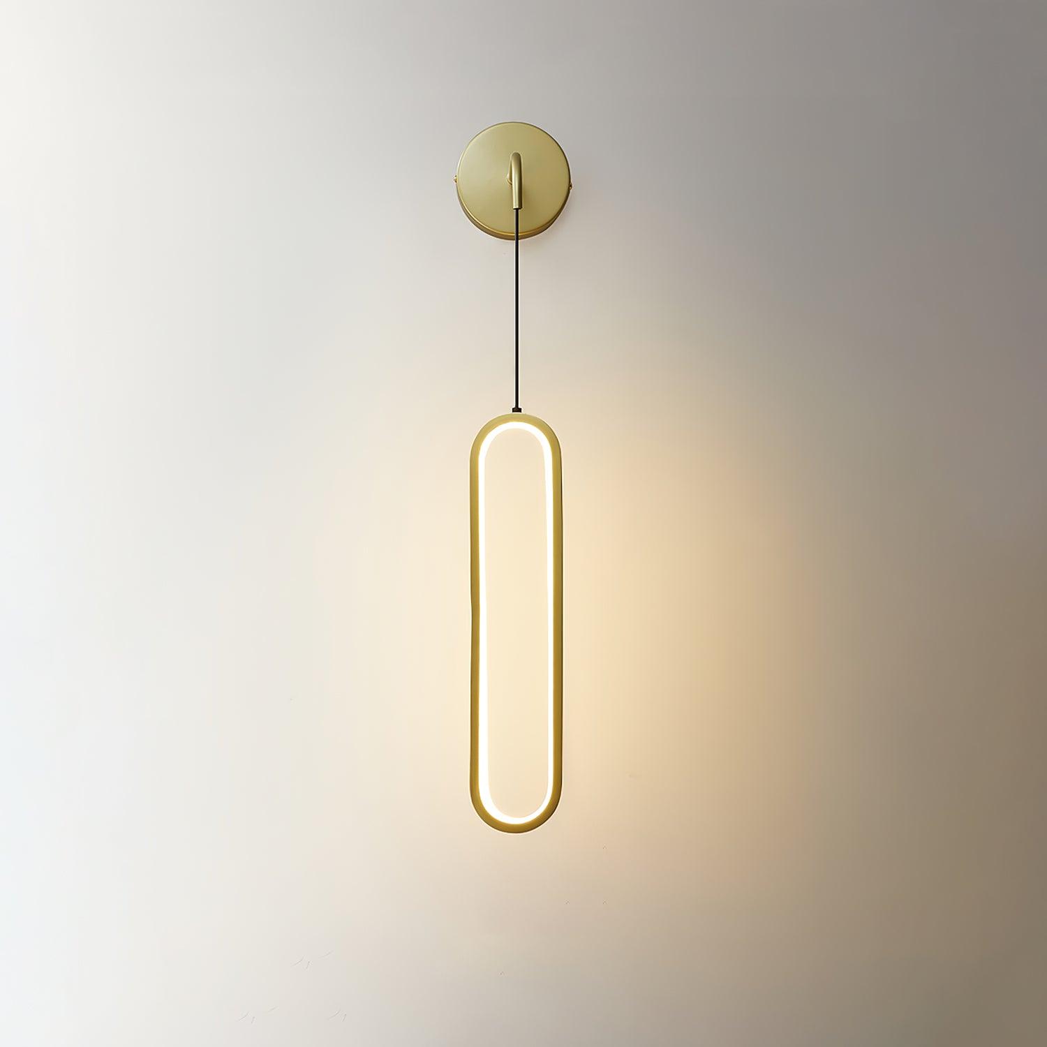 Front view of Brass wall plate and lit oval ring