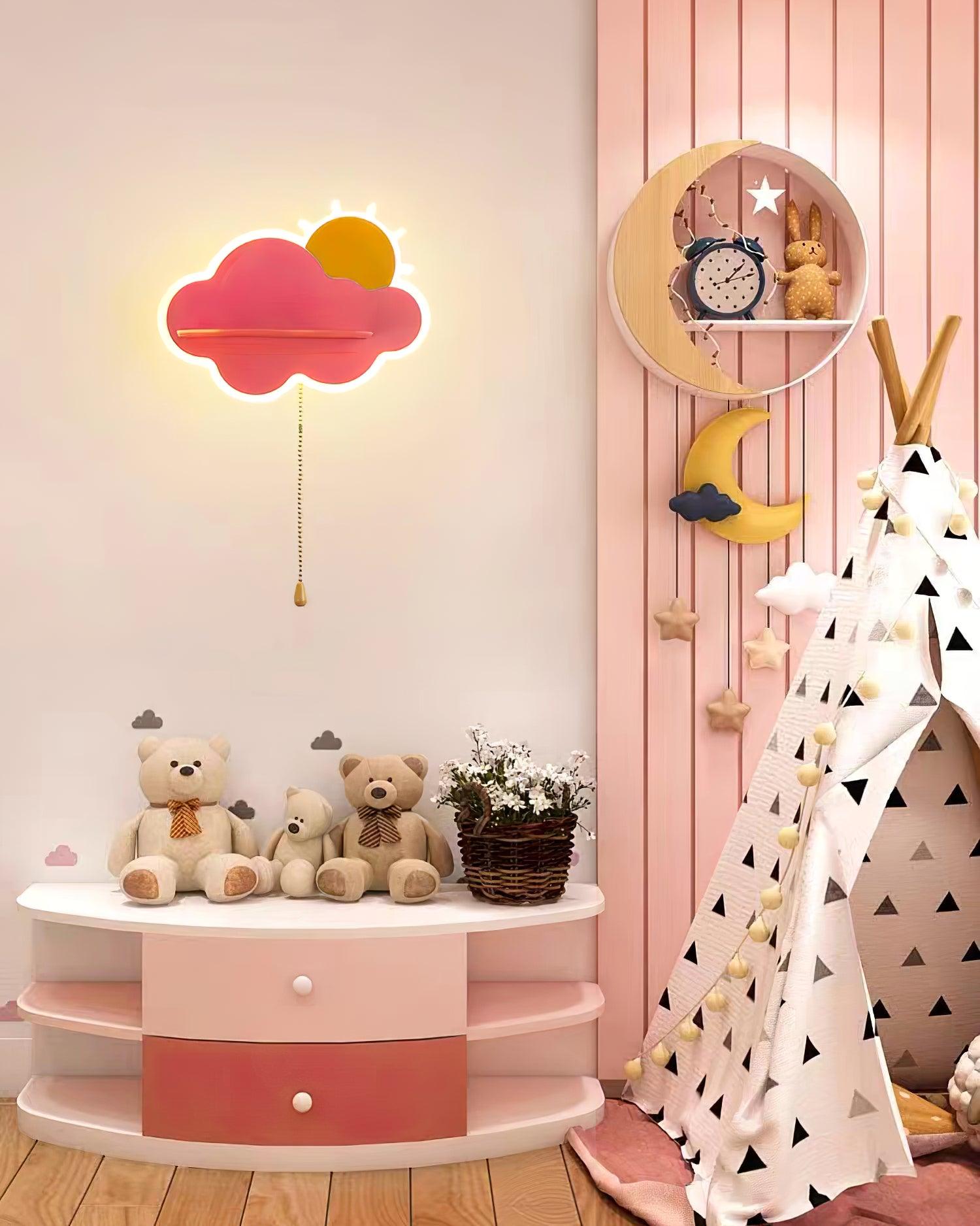 Pink cloud lamp above a cabinet with toys
