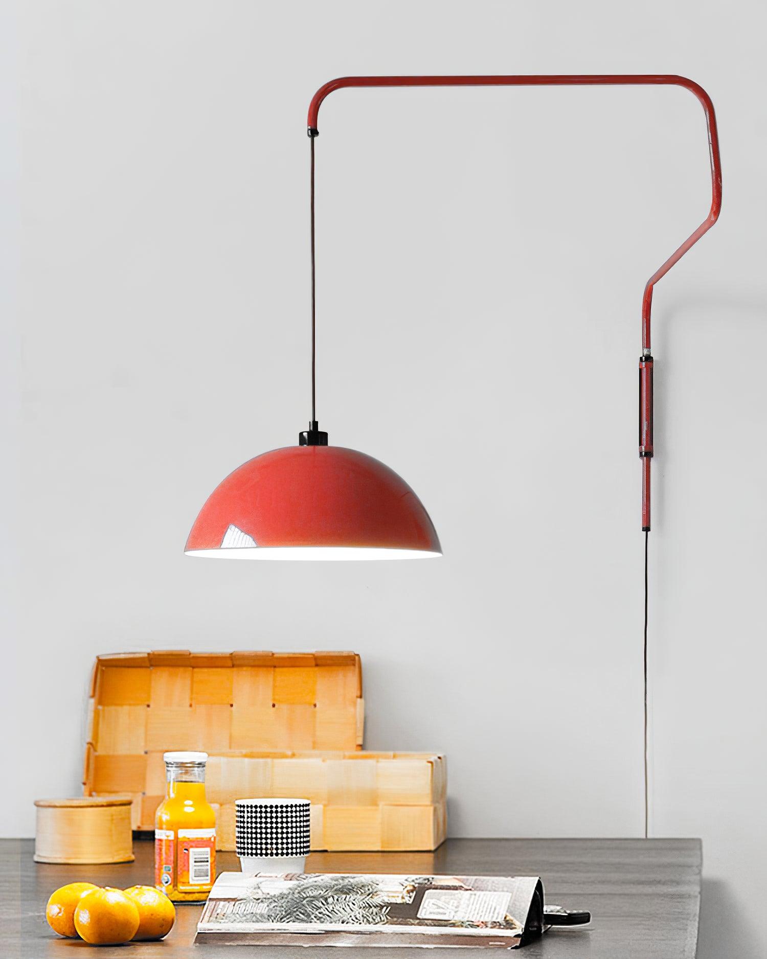 Suspended red dome over a kitchen worktop