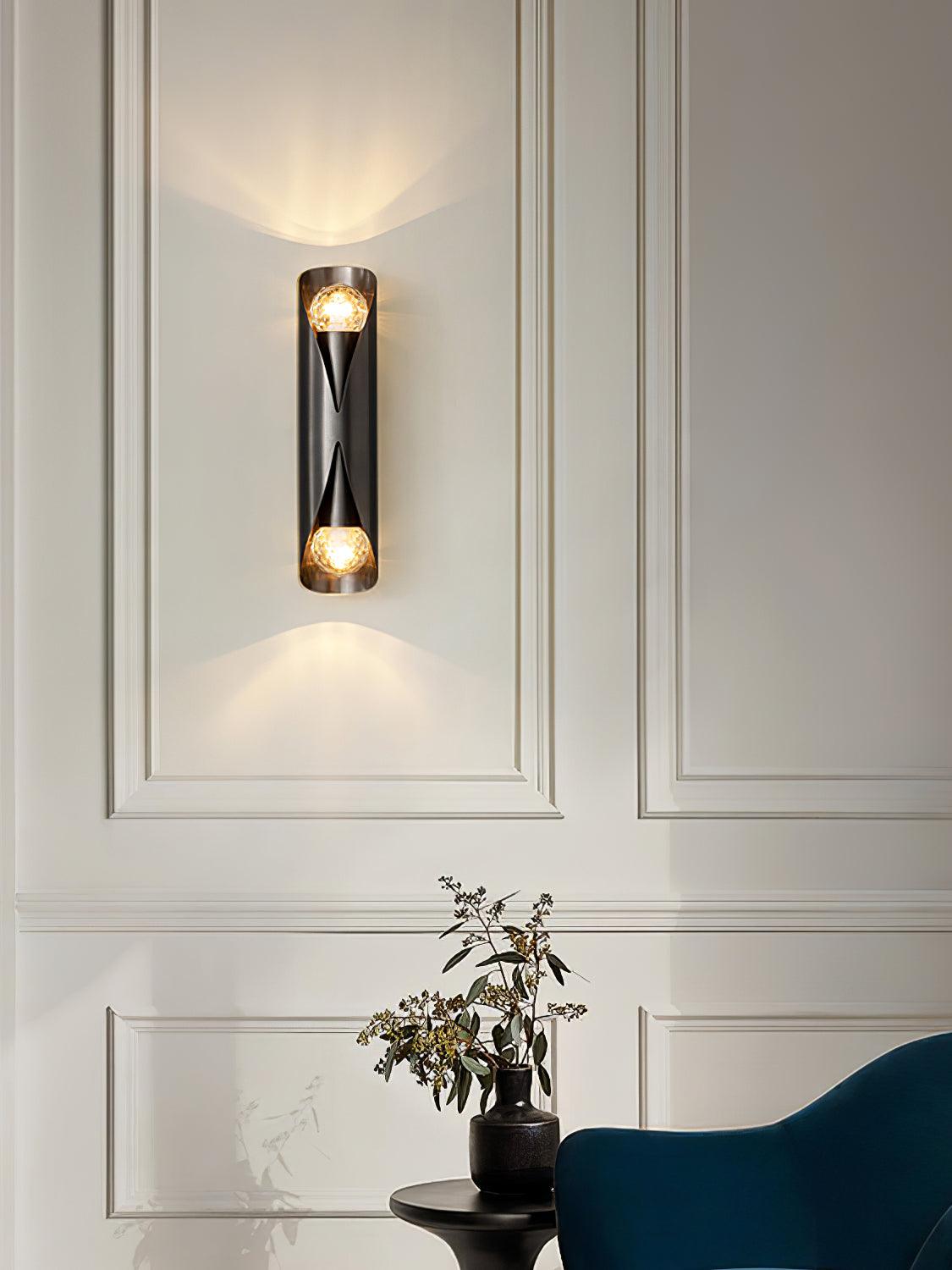 Black slim wall lamp beside a chair