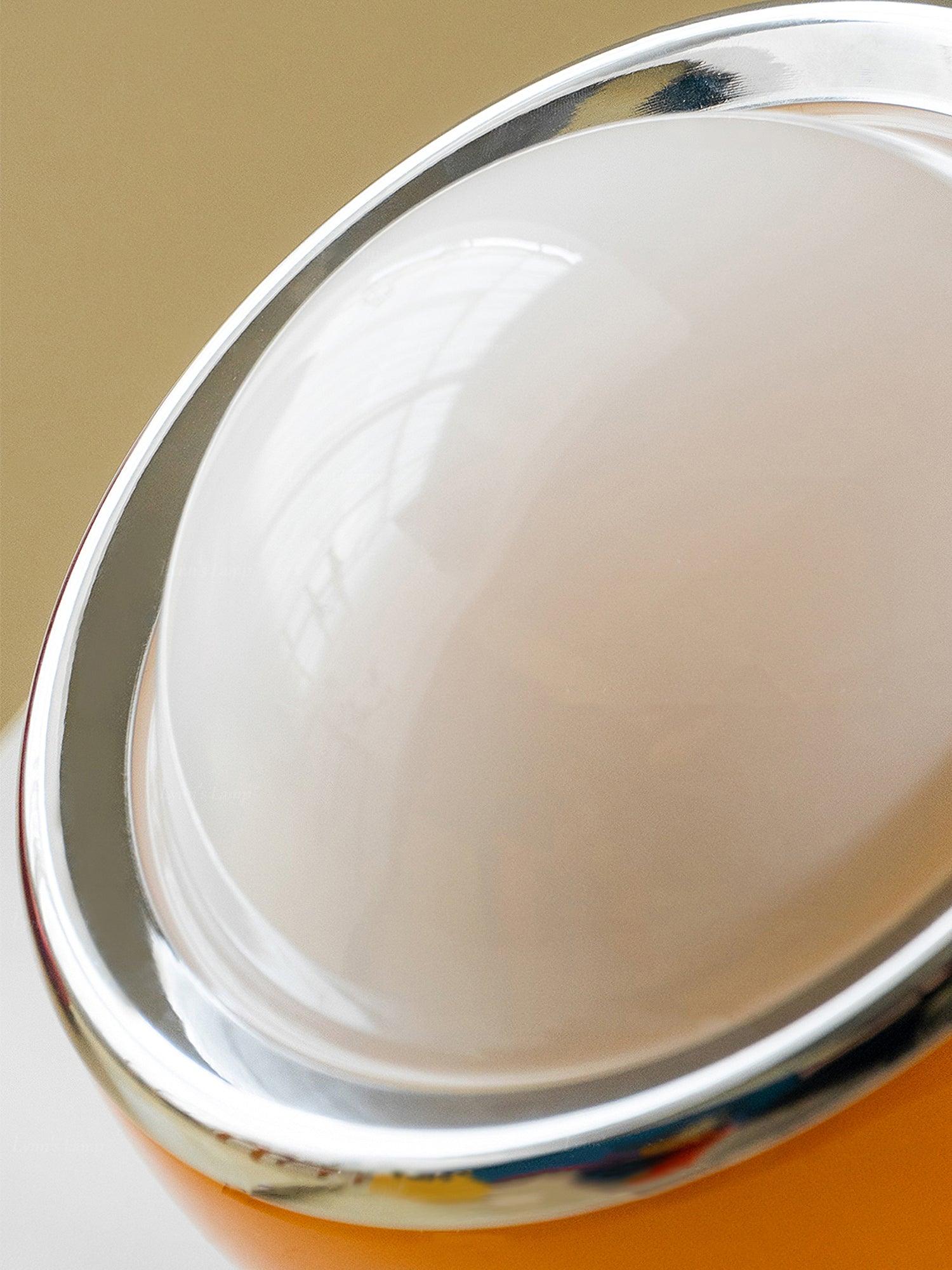 Detail of Valeria curved glass and chrome-colour ring