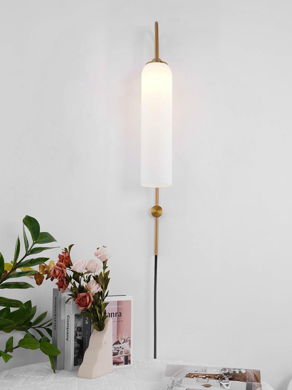 White glass shade and gold-coloured wall stem