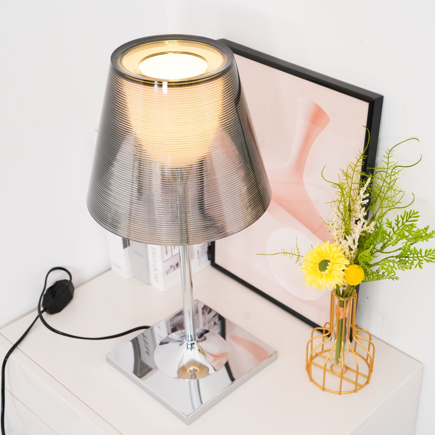 Upper view of the glowing Chrome Prism diffuser and shade