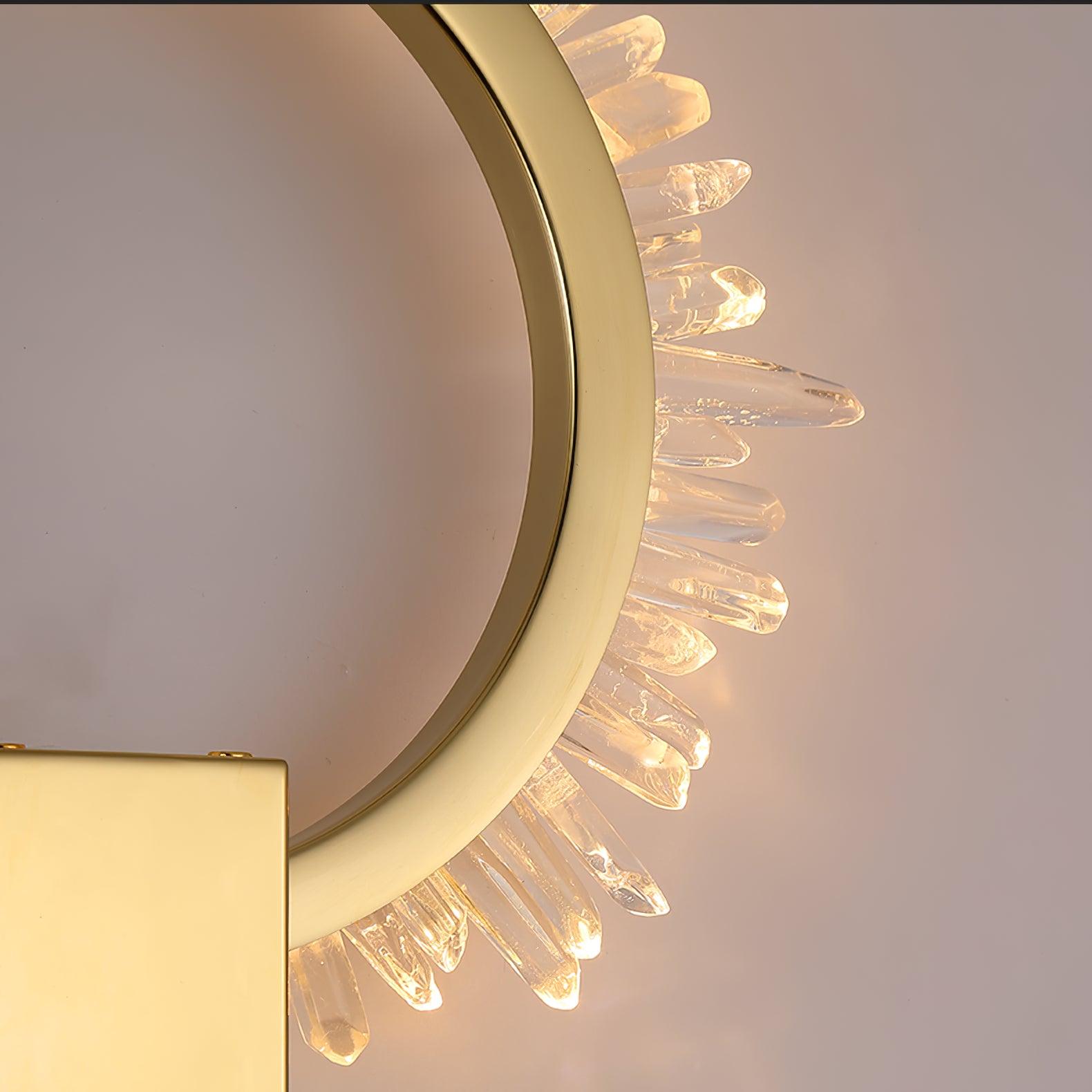 Close-up of the illuminated clear crystal points along the right side of the gold ring