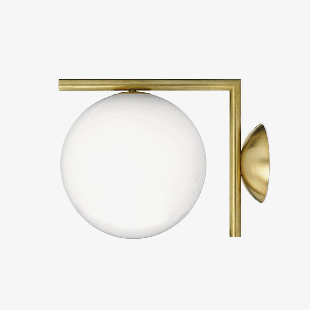 Opal glass globe wall light with a gold-tone angular frame and round wall plate